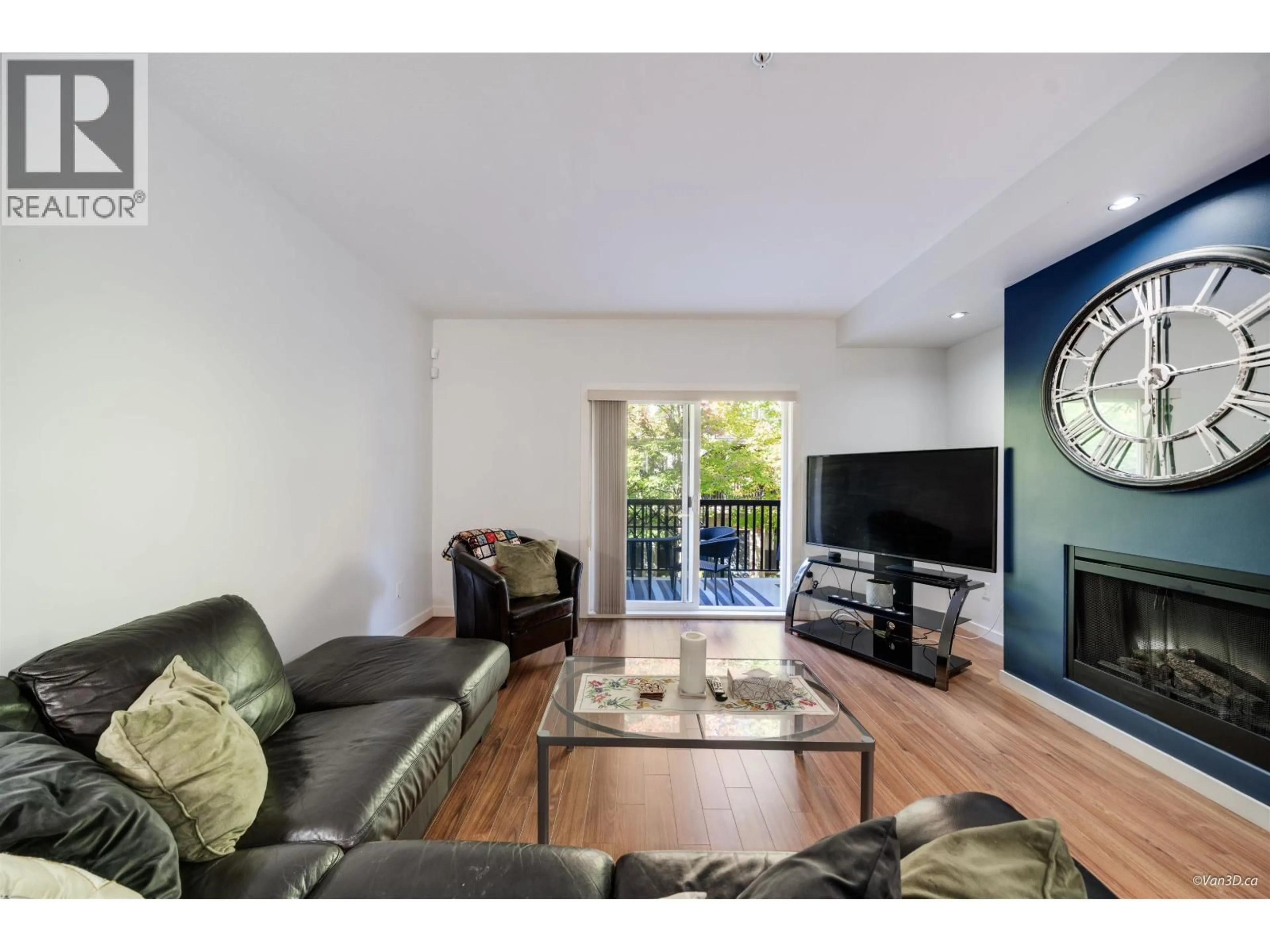 Living room with furniture, wood/laminate floor for 25 - 550 BROWNING PLACE, North Vancouver British Columbia V7H3A9
