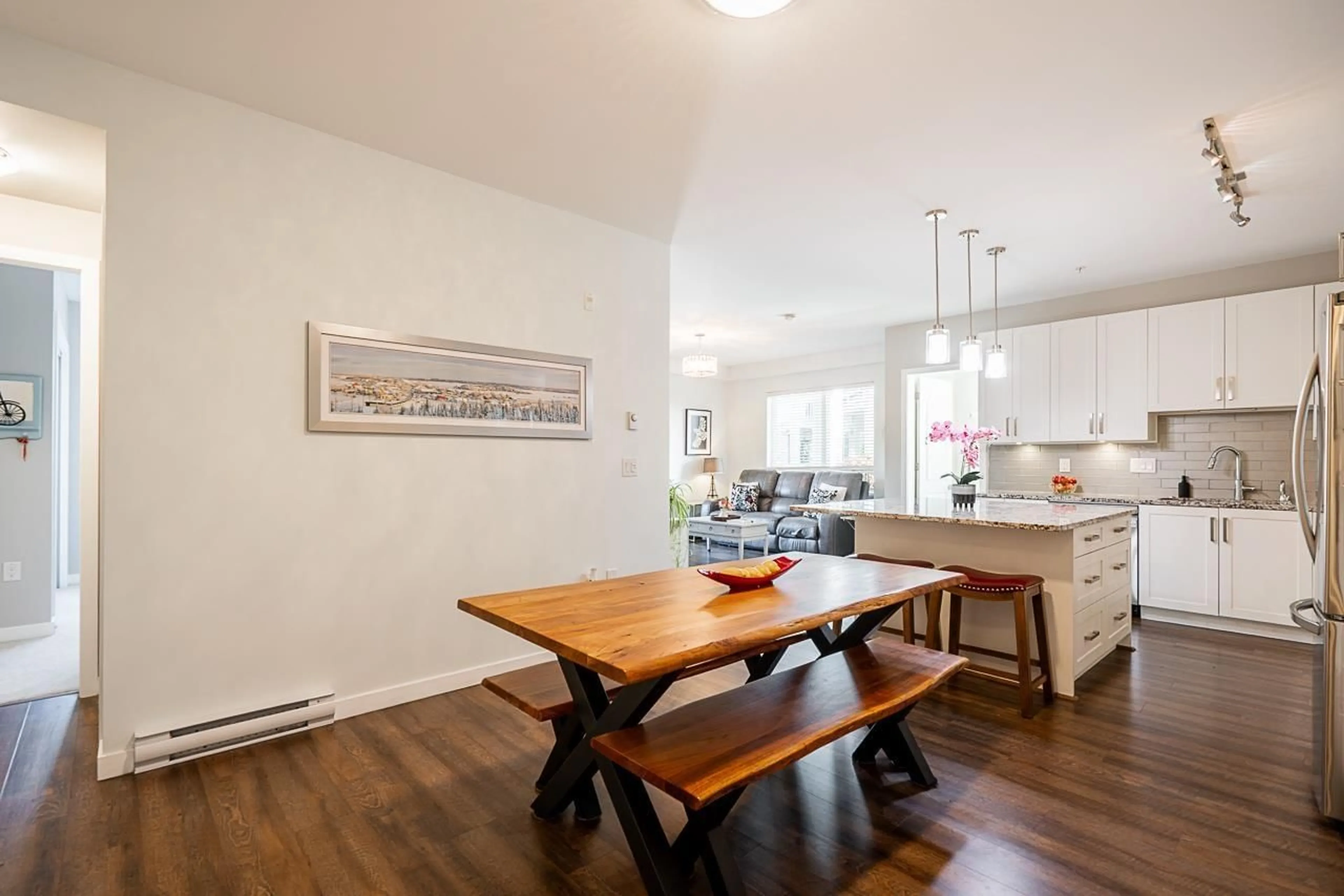 Open concept kitchen, wood/laminate floor for 214 - 6490 194, Surrey British Columbia V4N6J9