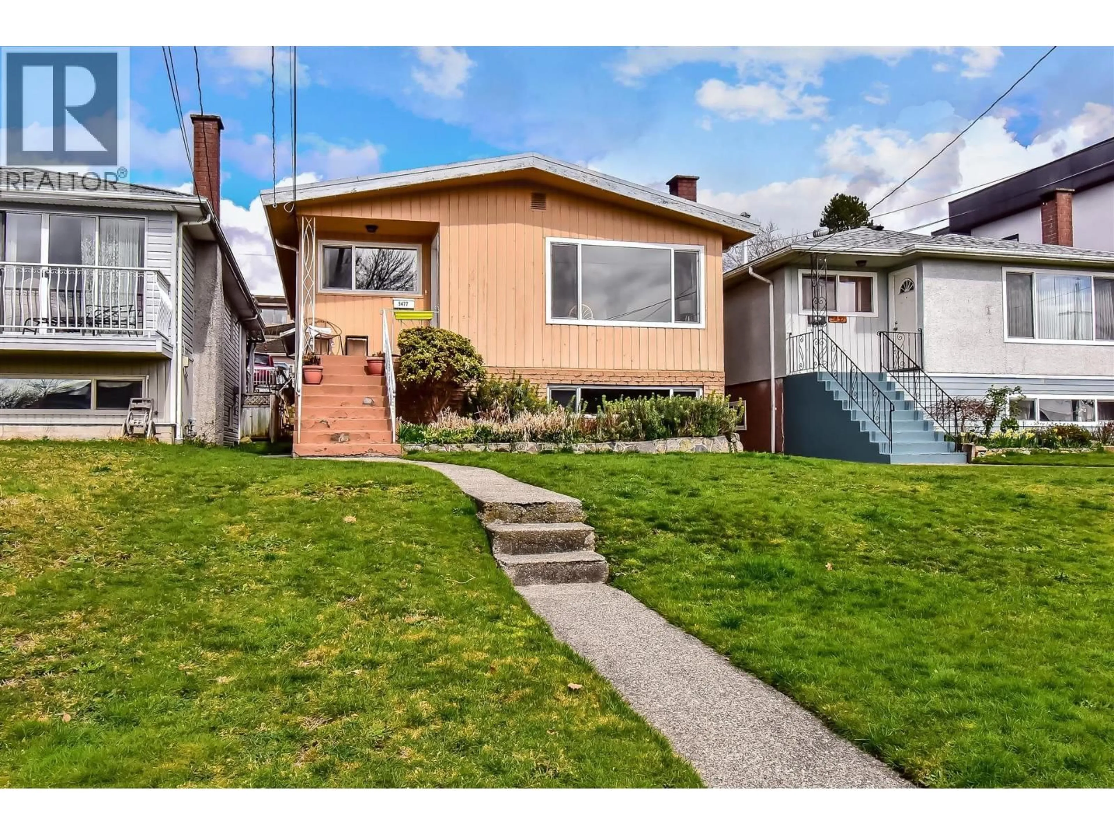 Home with vinyl exterior material, street for 5477 PORTLAND STREET, Burnaby British Columbia V5J2R5