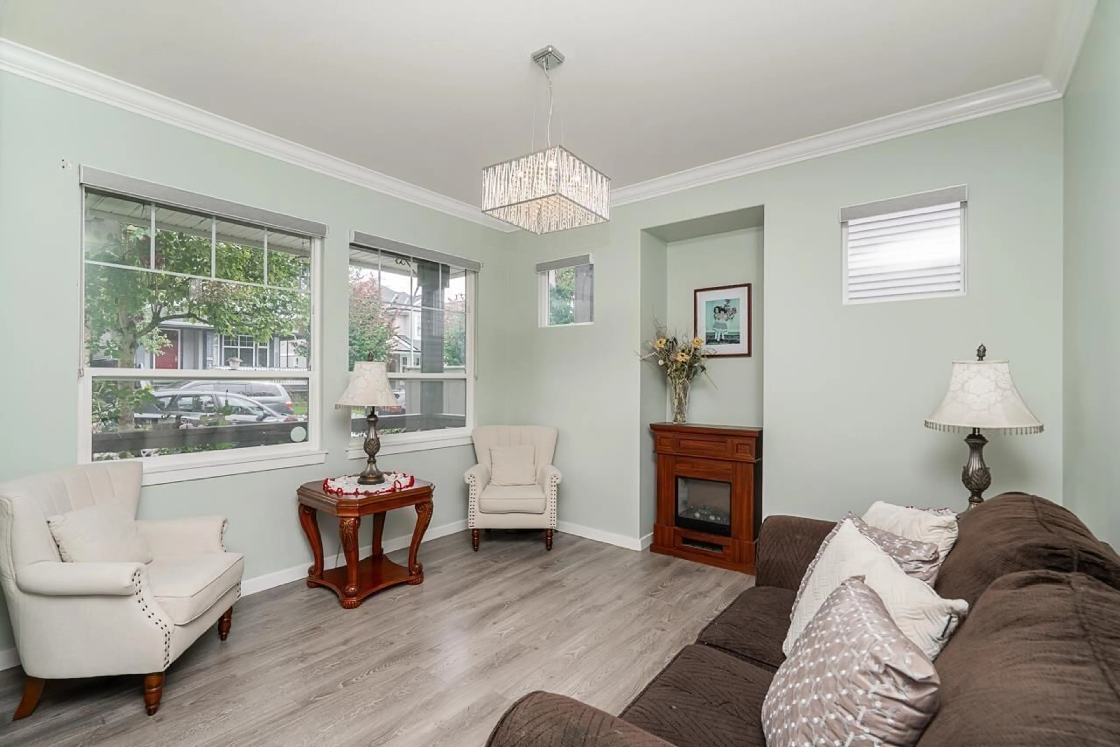 Living room with furniture, wood/laminate floor for 14858 56A, Surrey British Columbia V3S8X1