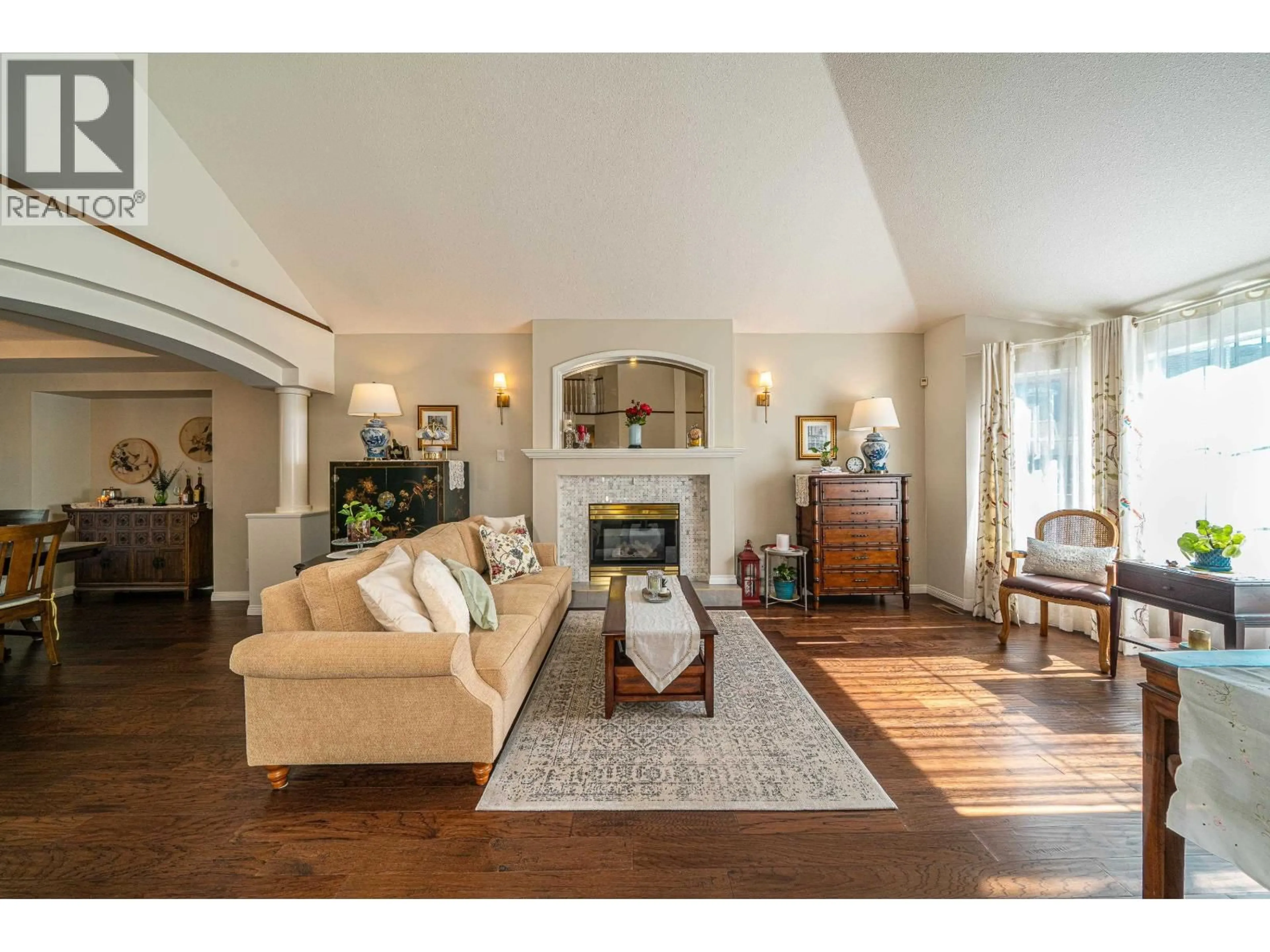 Living room with furniture, wood/laminate floor for 1577 LODGEPOLE PLACE, Coquitlam British Columbia V3E2V9