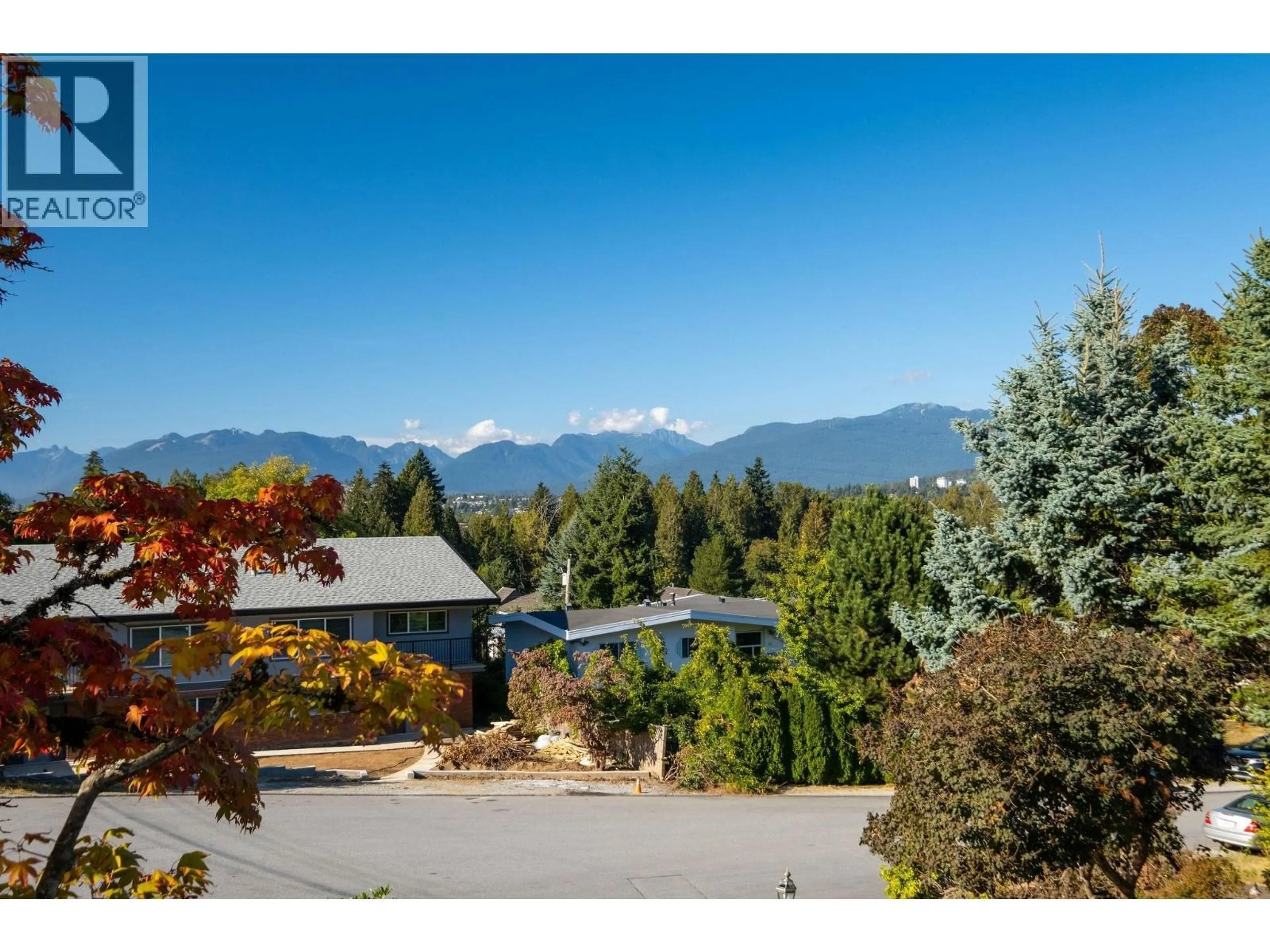 A pic from outside/outdoor area/front of a property/back of a property/a pic from drone, mountain view for 7740 ALLMAN STREET, Burnaby British Columbia V5E2B1