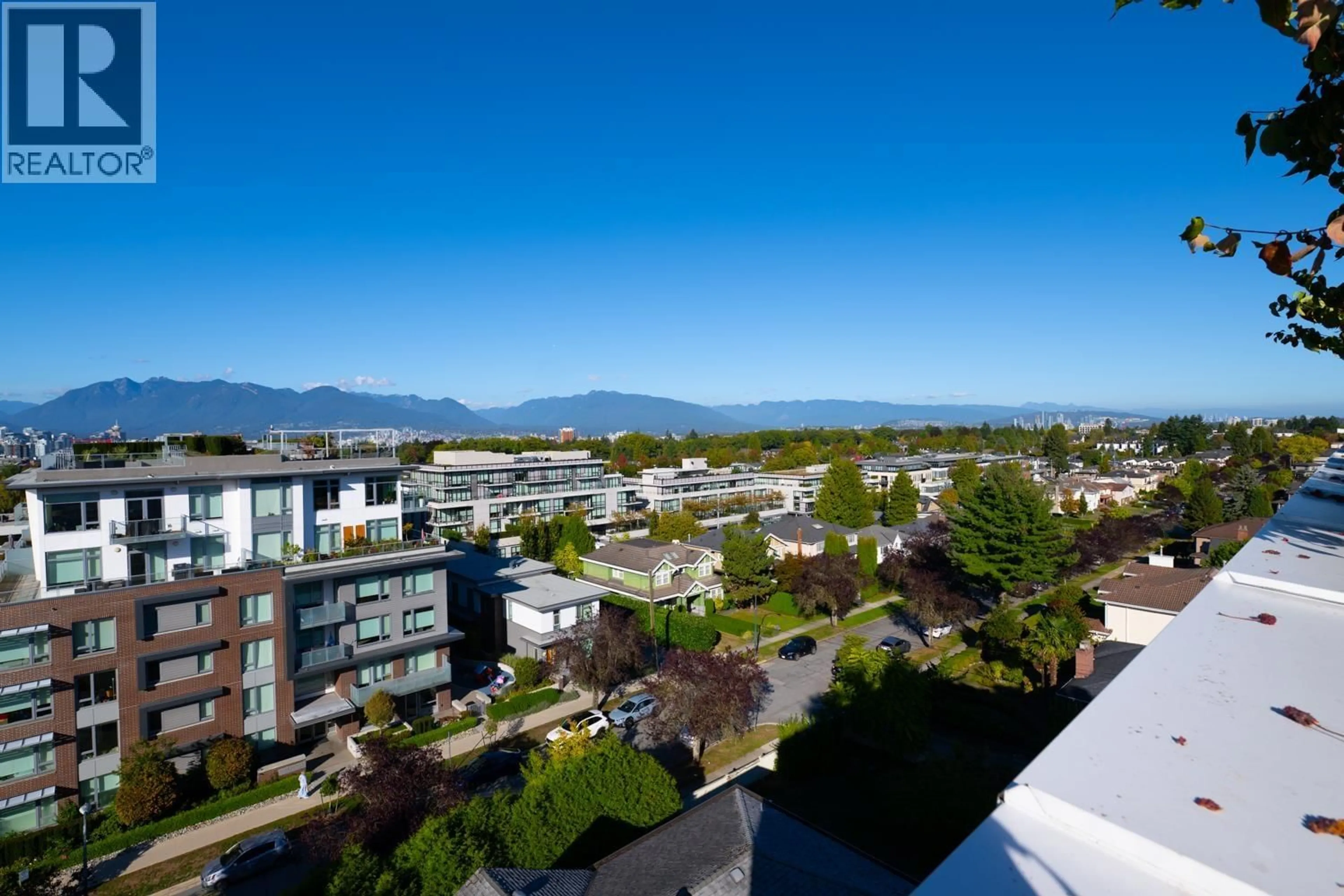A pic from outside/outdoor area/front of a property/back of a property/a pic from drone, mountain view for 212 - 4240 CAMBIE STREET, Vancouver British Columbia V5Z0K6