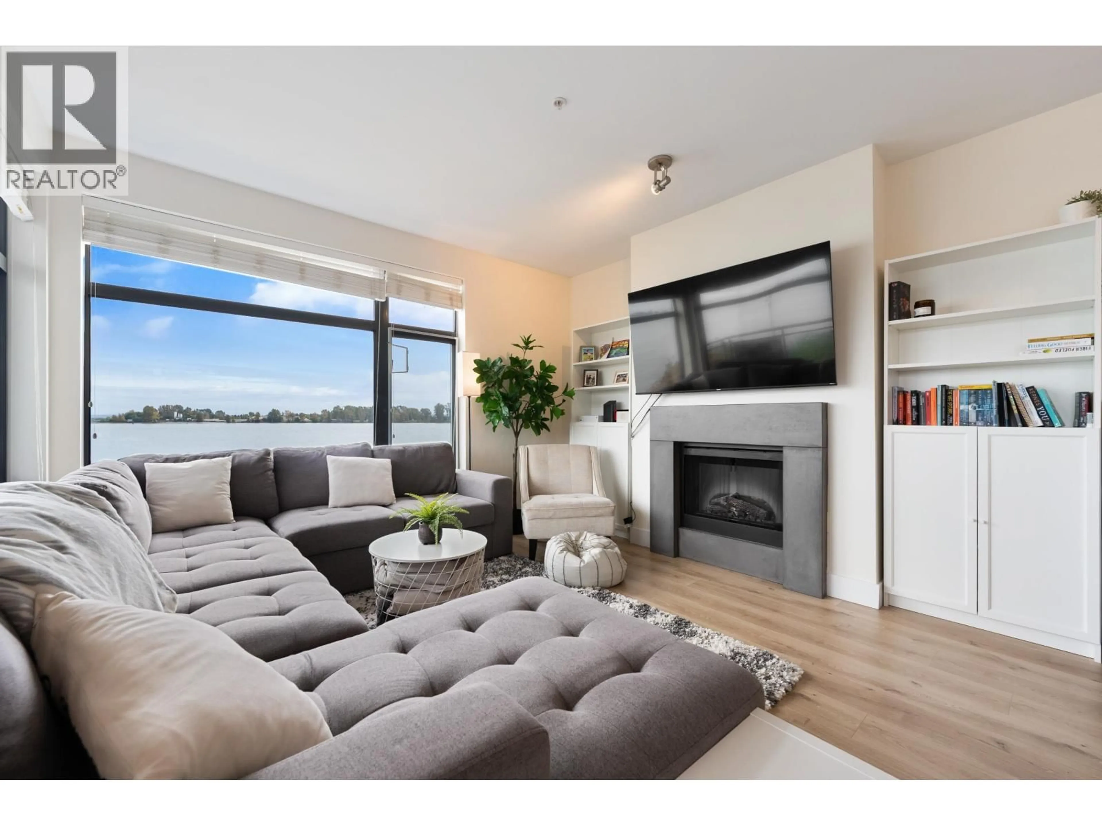 Living room with furniture, unknown for 210 - 14200 RIVERPORT WAY, Richmond British Columbia V6W1M4
