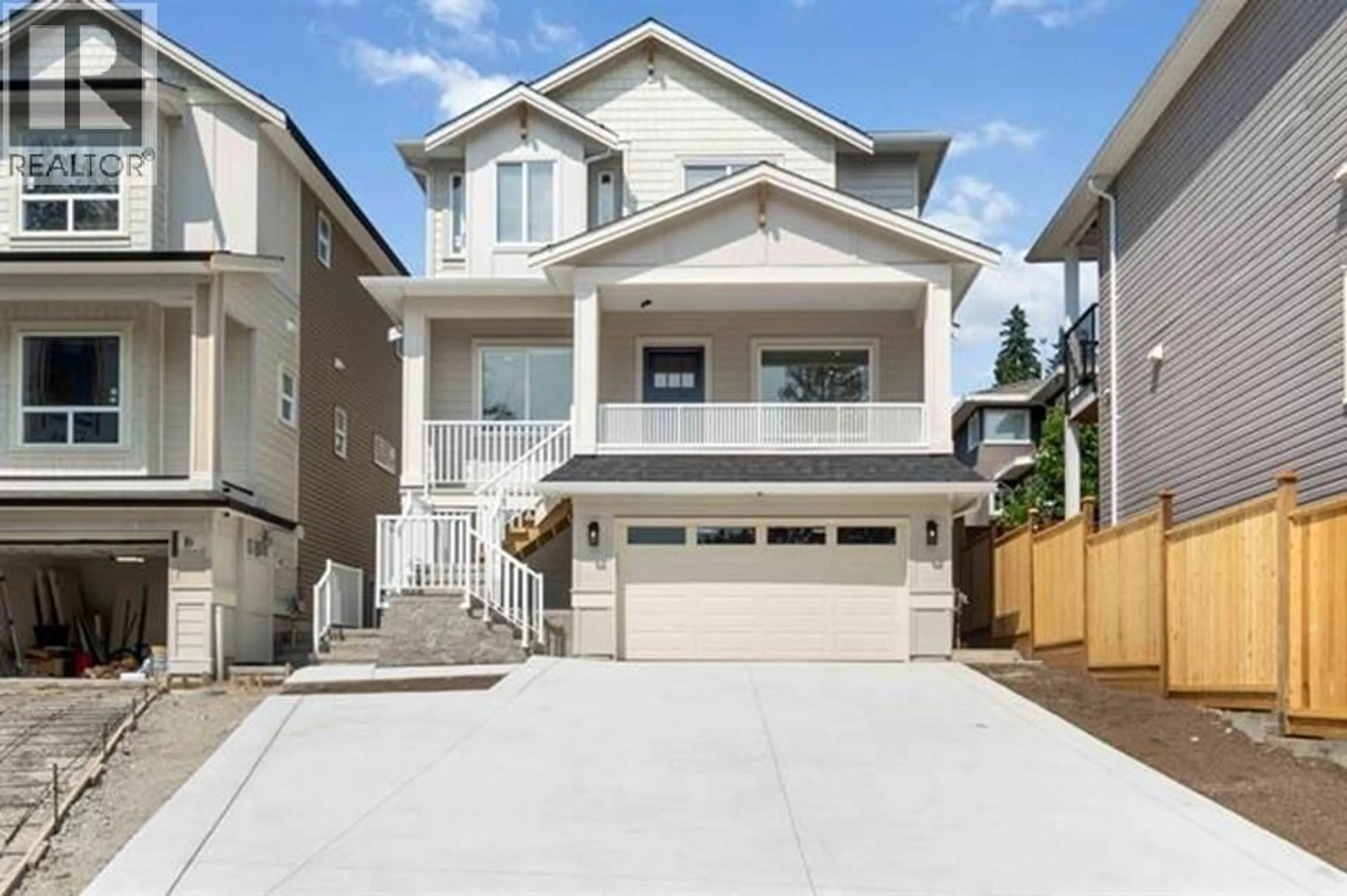 Home with vinyl exterior material, street for 3456A DARWIN AVENUE, Coquitlam British Columbia V3B0E5