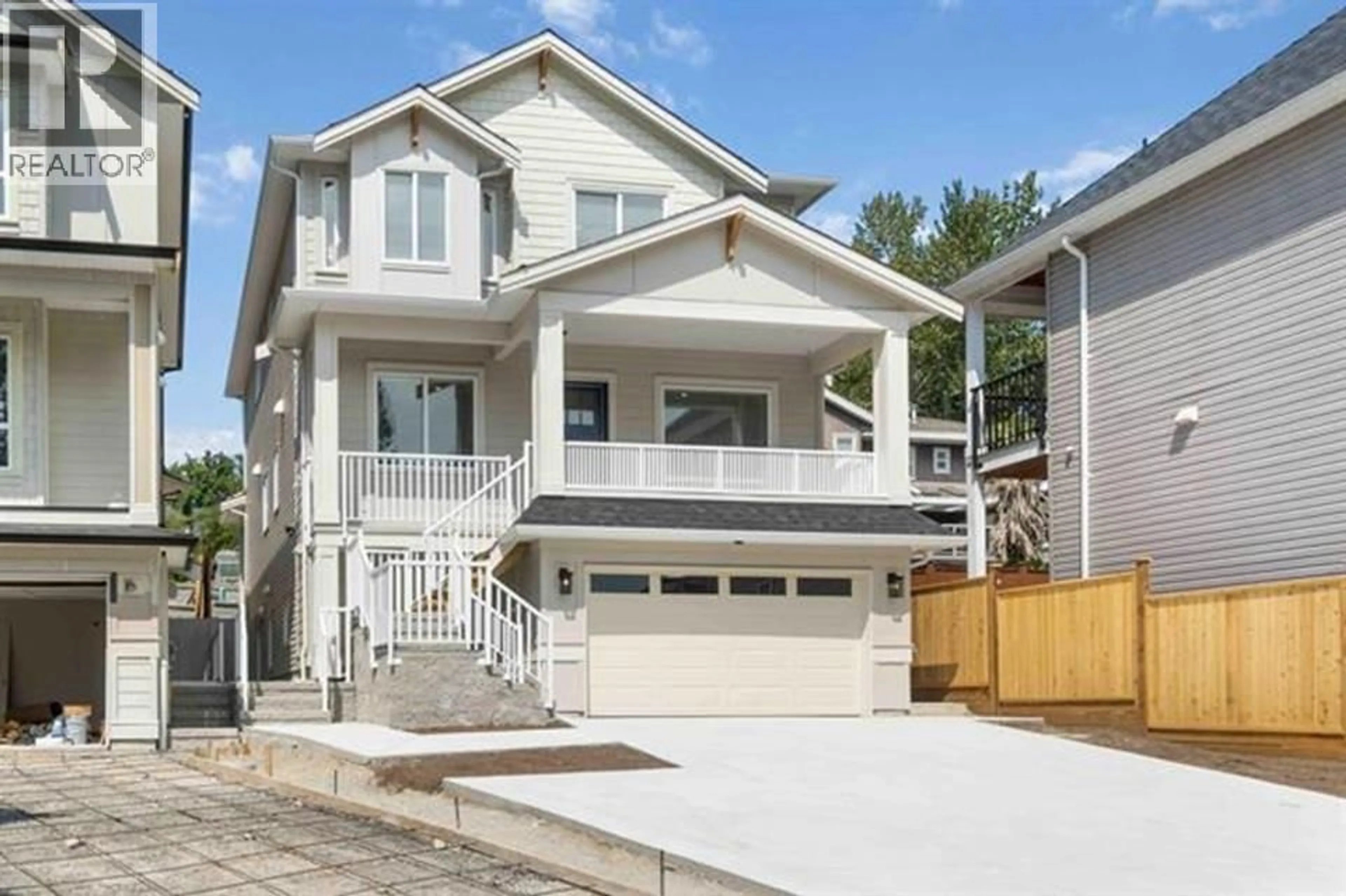 Home with vinyl exterior material, street for 3456A DARWIN AVENUE, Coquitlam British Columbia V3B0E5