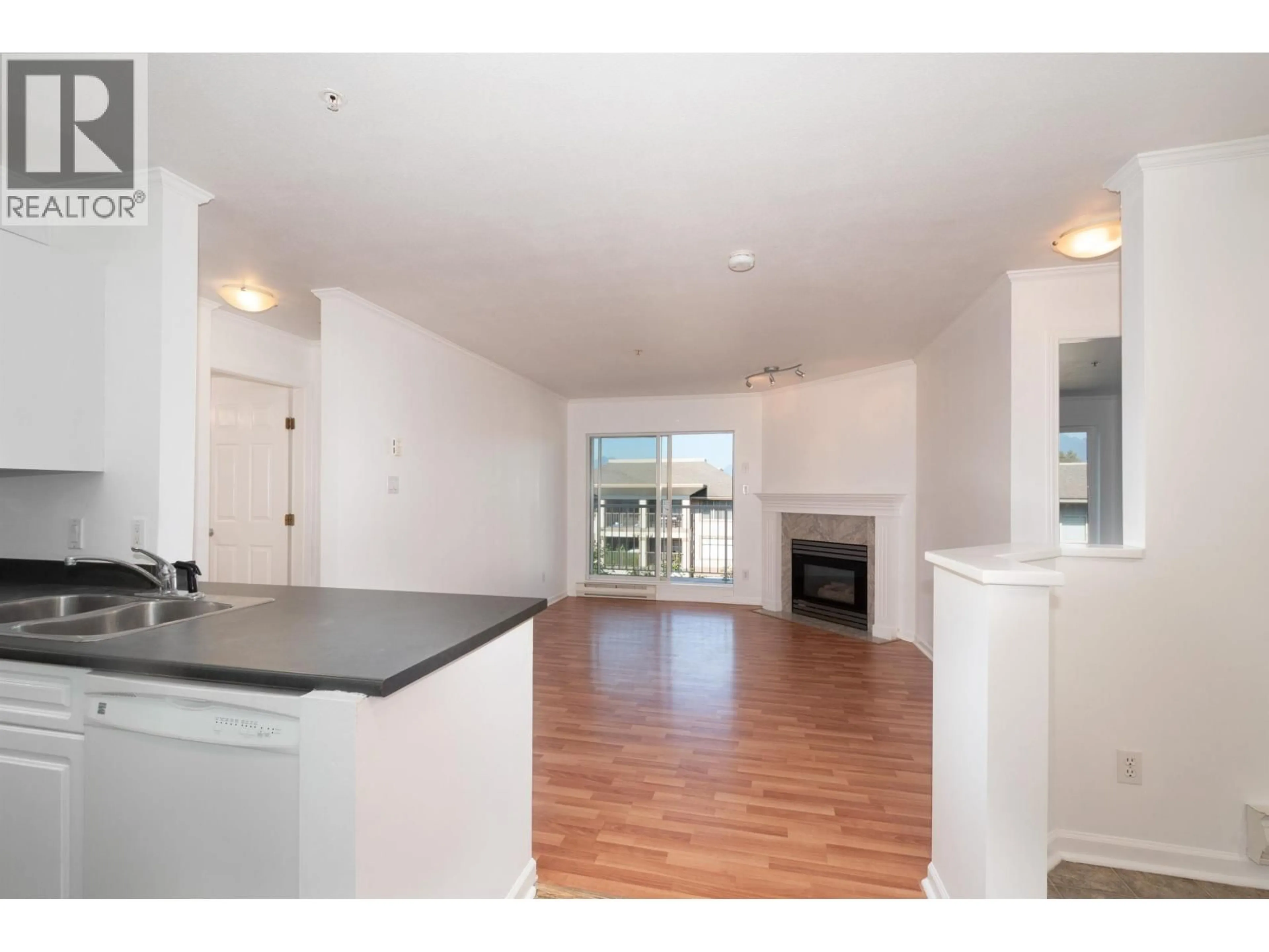 Open concept kitchen, wood/laminate floor for 403 - 12206 224 STREET, Maple Ridge British Columbia V2X6B8