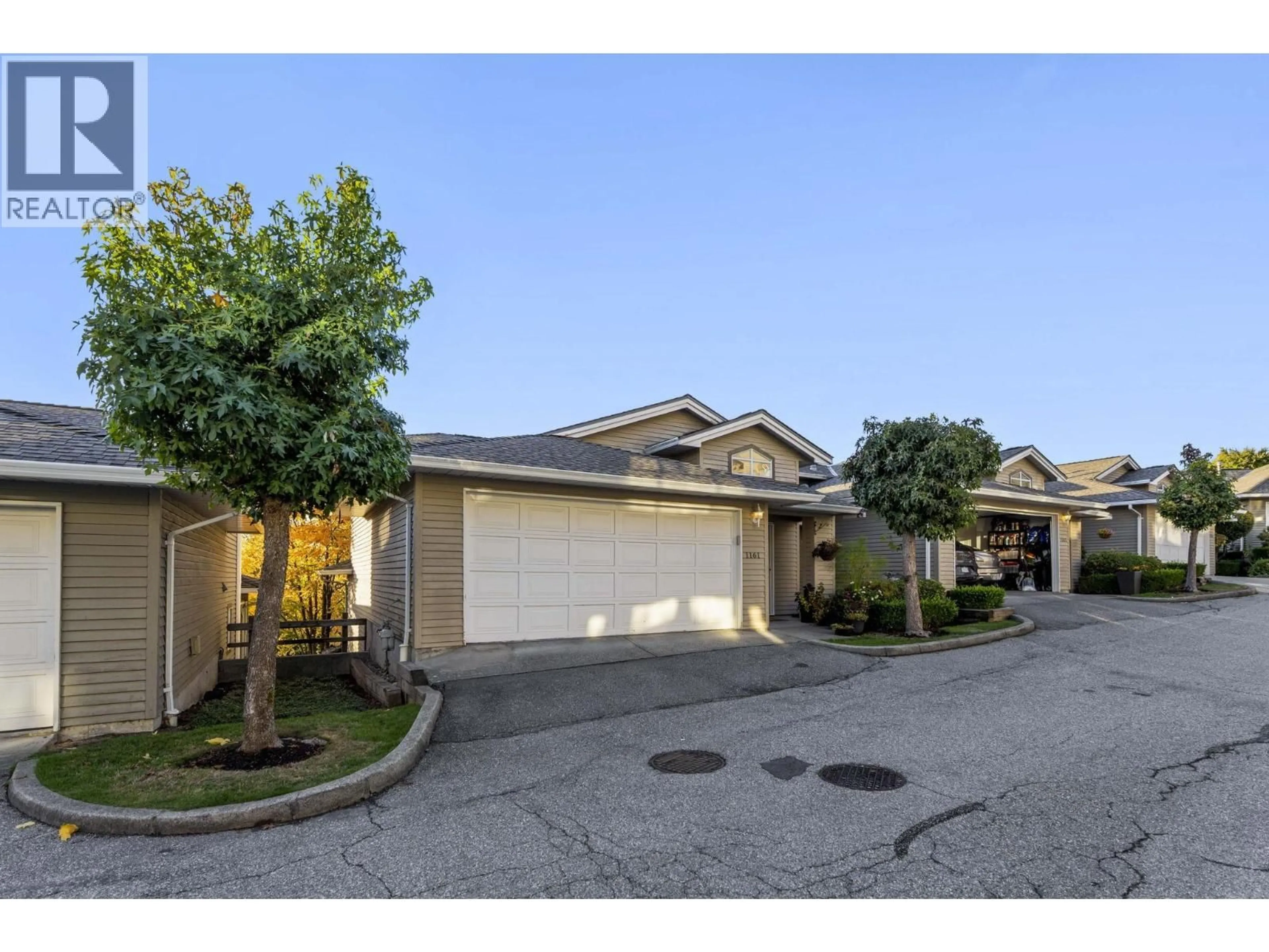 A pic from outside/outdoor area/front of a property/back of a property/a pic from drone, street for 1161 O'FLAHERTY GATE, Port Coquitlam British Columbia V3C6H2