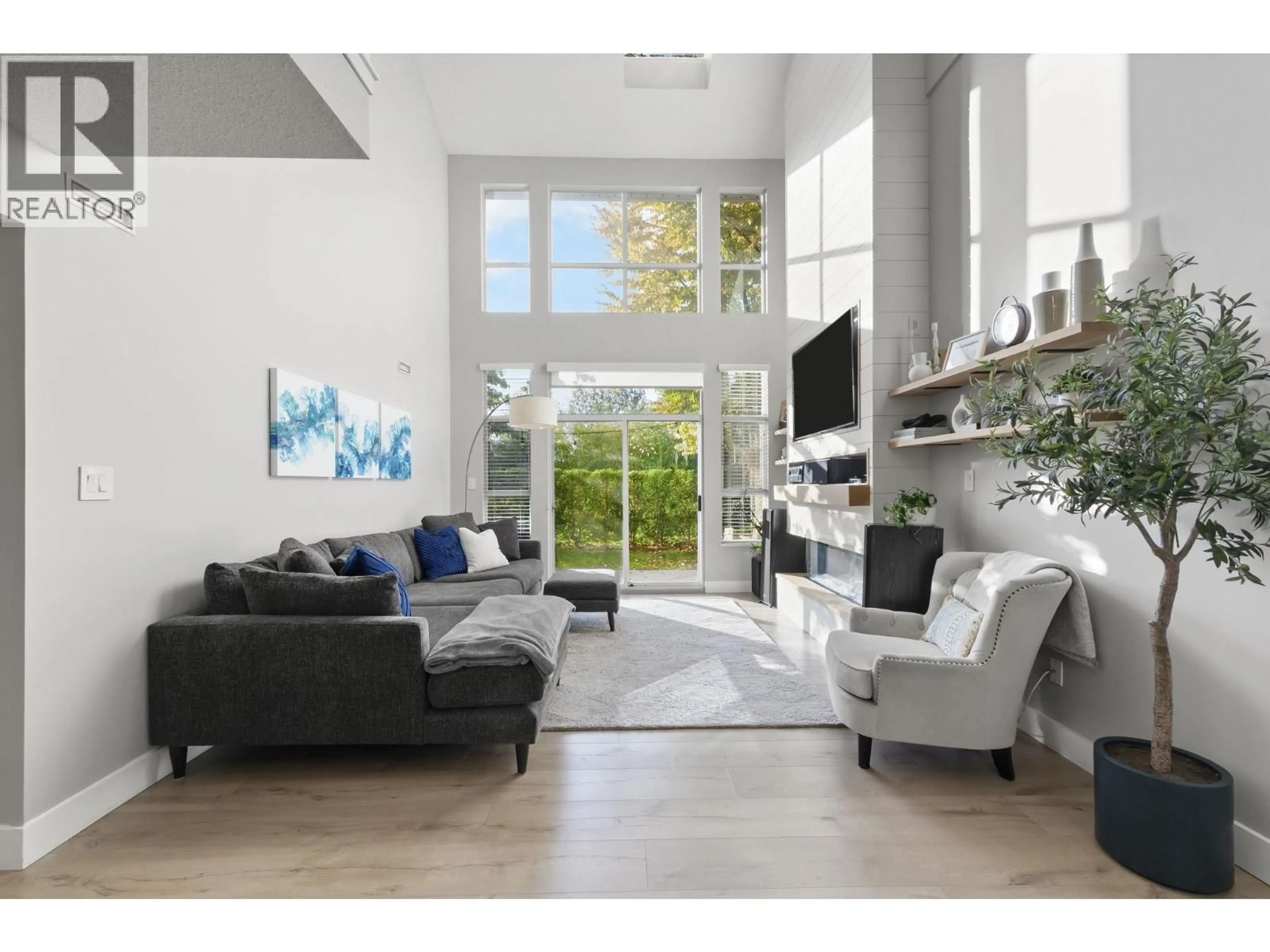 Living room with furniture, ceramic/tile floor for 1161 O'FLAHERTY GATE, Port Coquitlam British Columbia V3C6H2