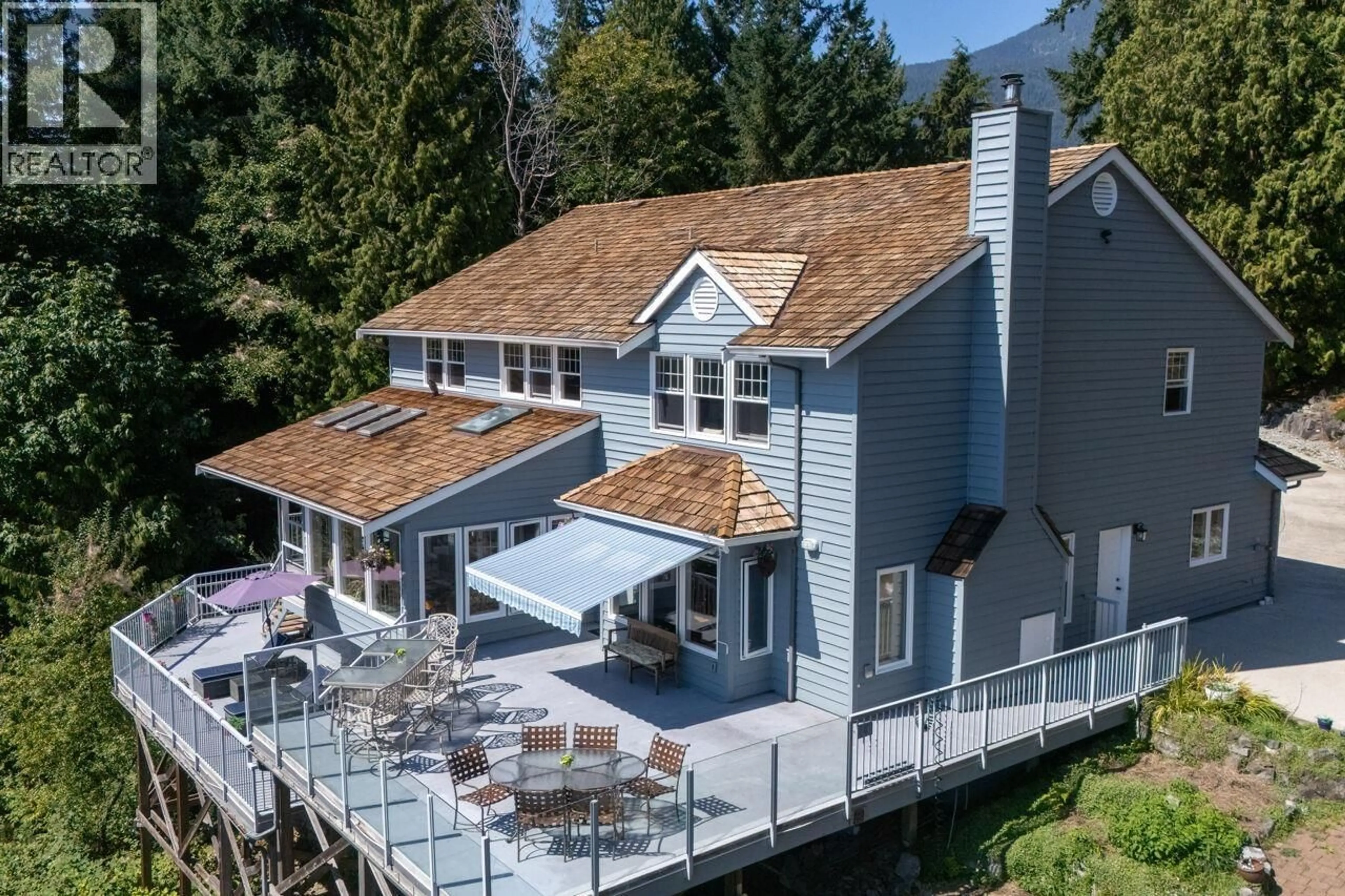 A pic from outside/outdoor area/front of a property/back of a property/a pic from drone, unknown for 63 CHADWICK ROAD, Gibsons British Columbia V0N1V6