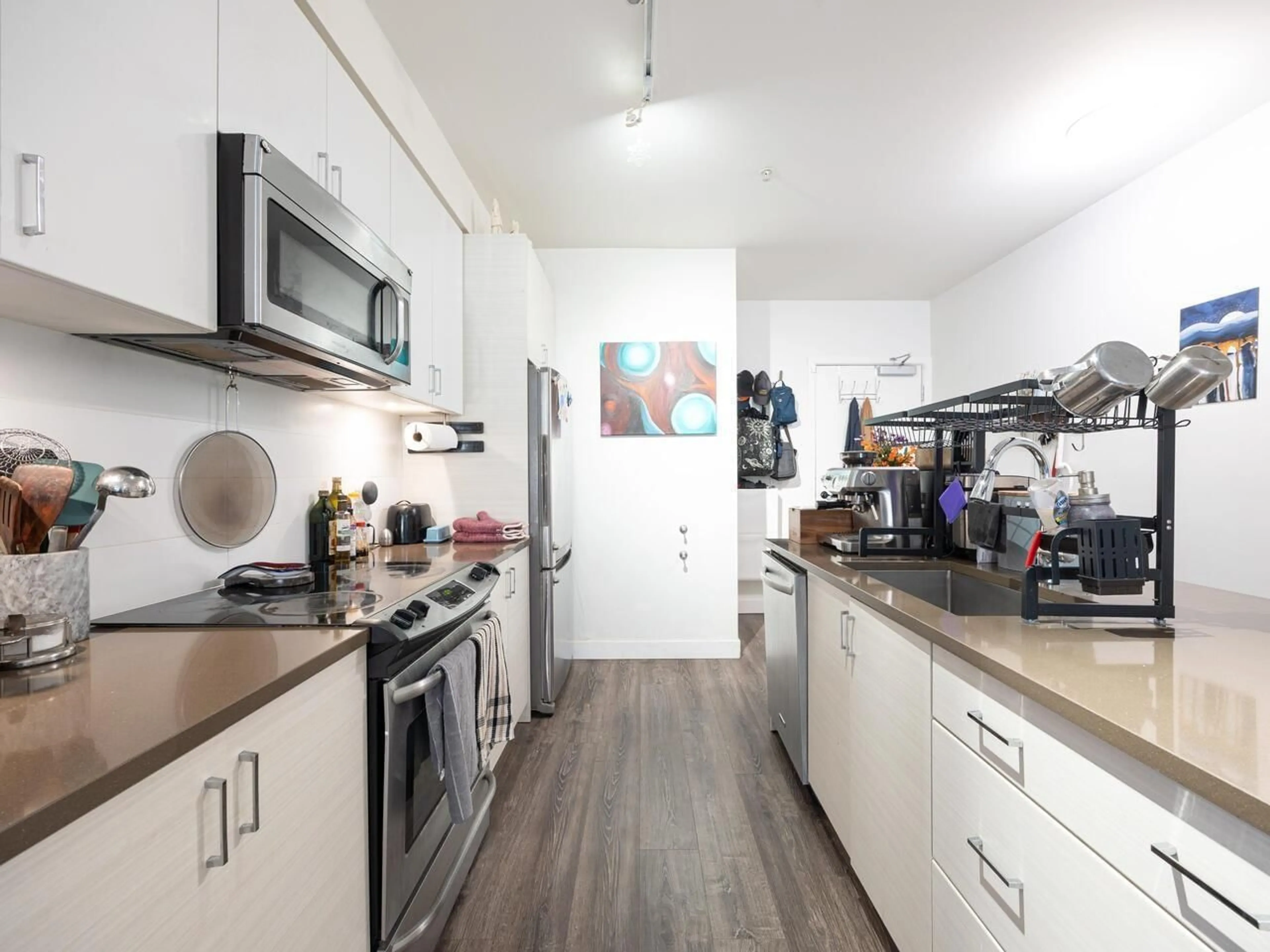 Open concept kitchen, unknown for 205 - 13919 FRASER, Surrey British Columbia V3T4E6