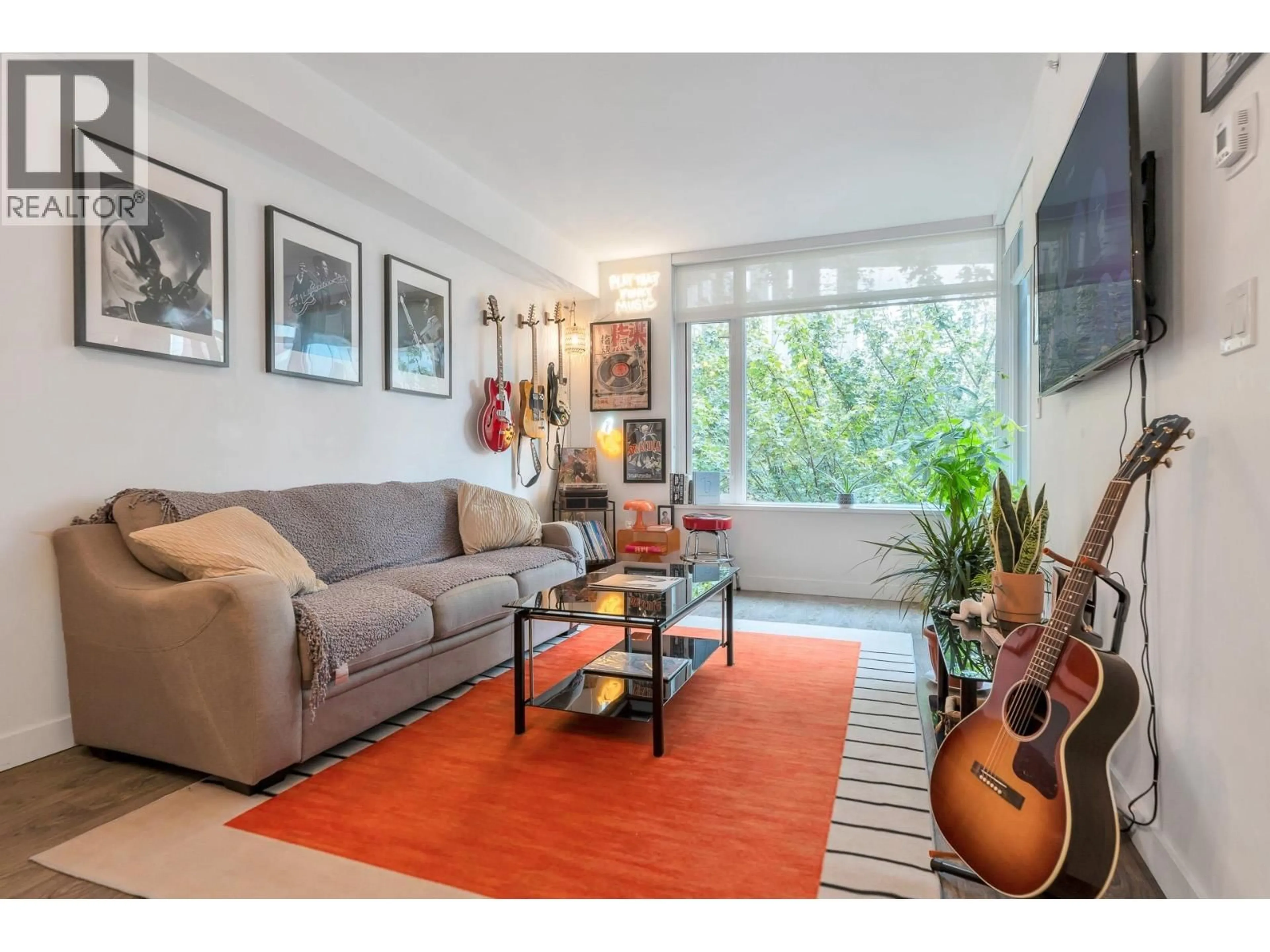 Living room with furniture, wood/laminate floor for 312 - 110 SWITCHMEN STREET, Vancouver British Columbia V6A0C6