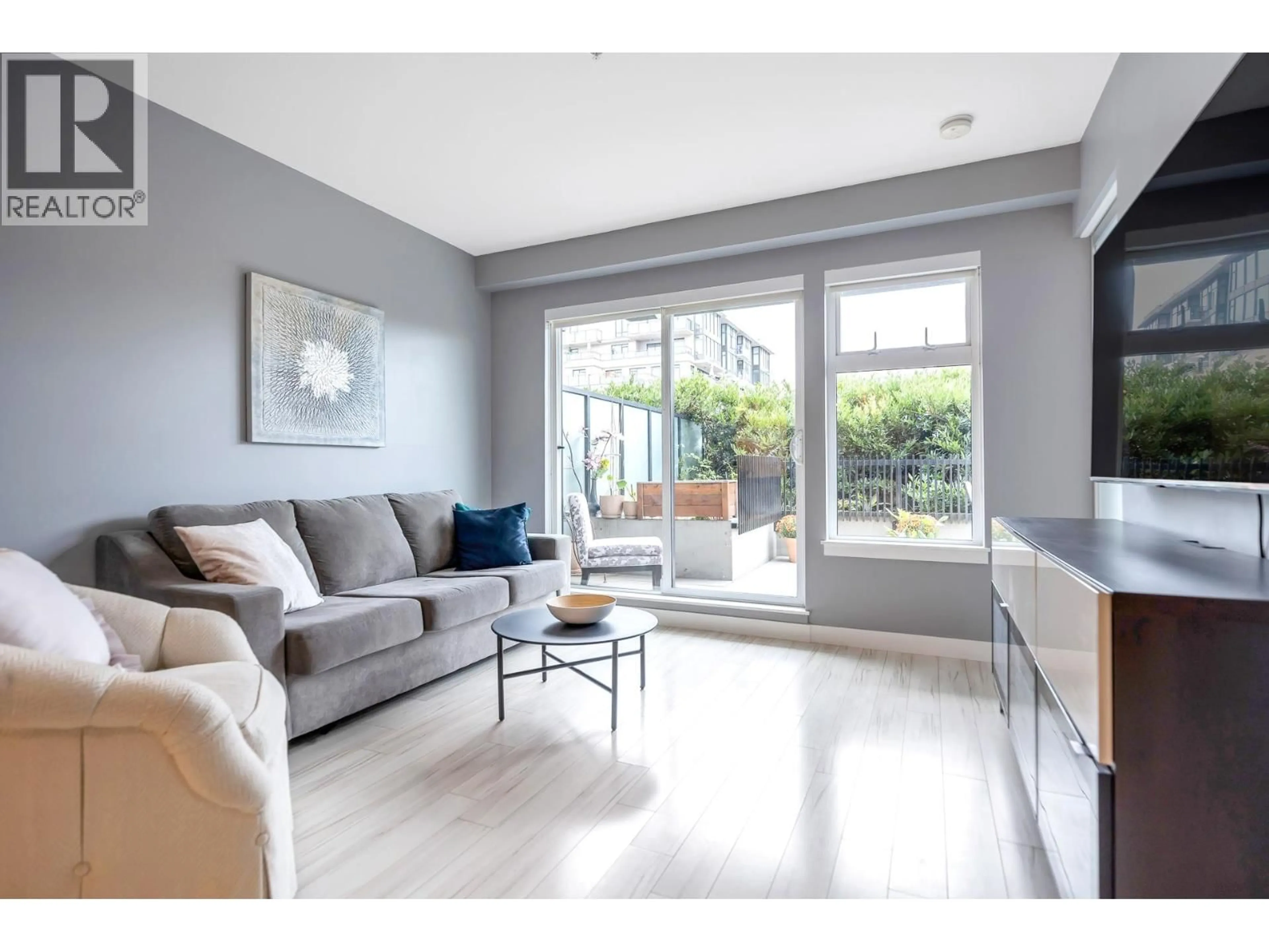 Living room with furniture, unknown for 212 - 111 3RD STREET, North Vancouver British Columbia V7L0C6