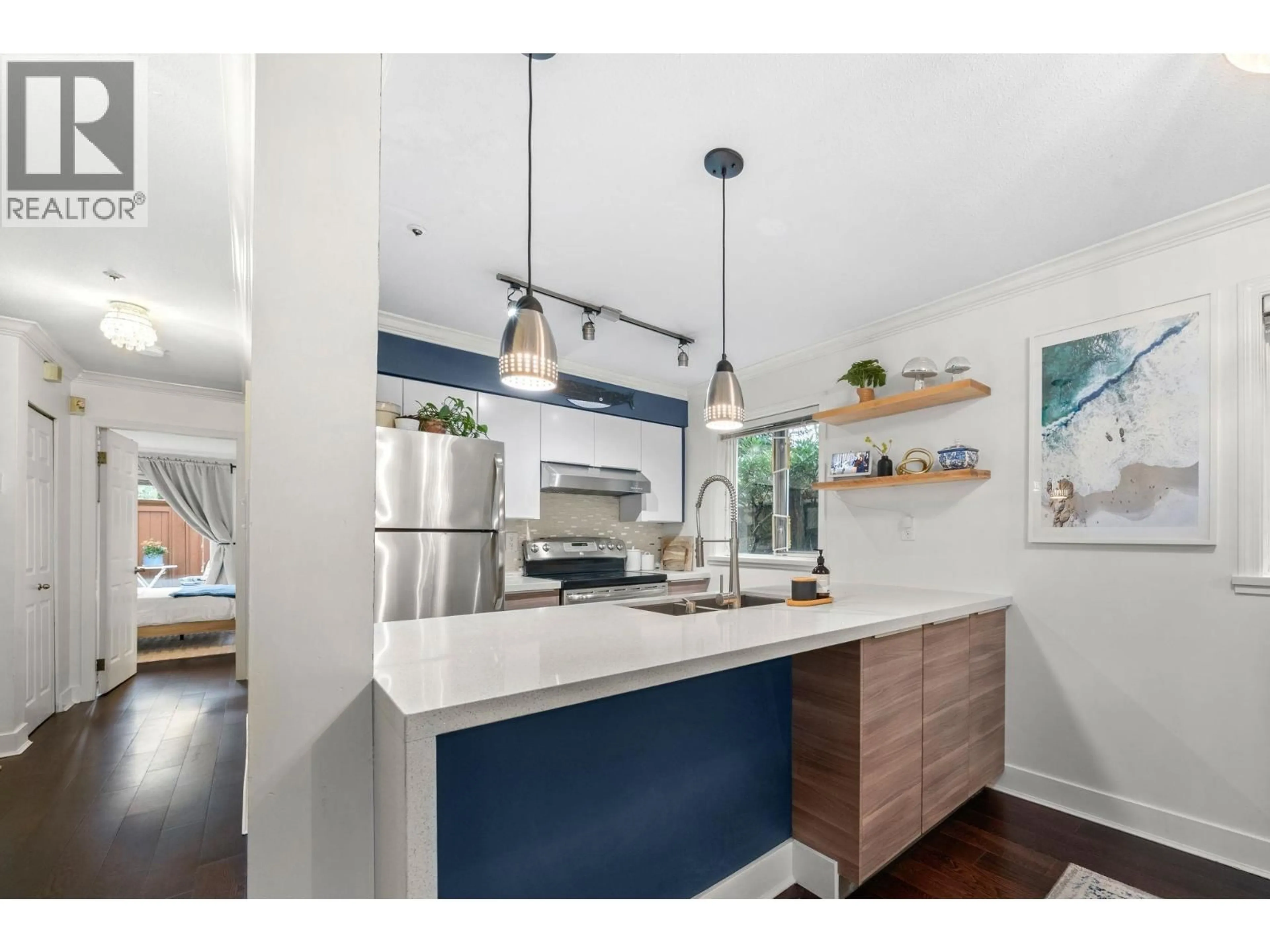 Open concept kitchen, unknown for 101 - 2215 MCGILL STREET, Vancouver British Columbia V5L1C3