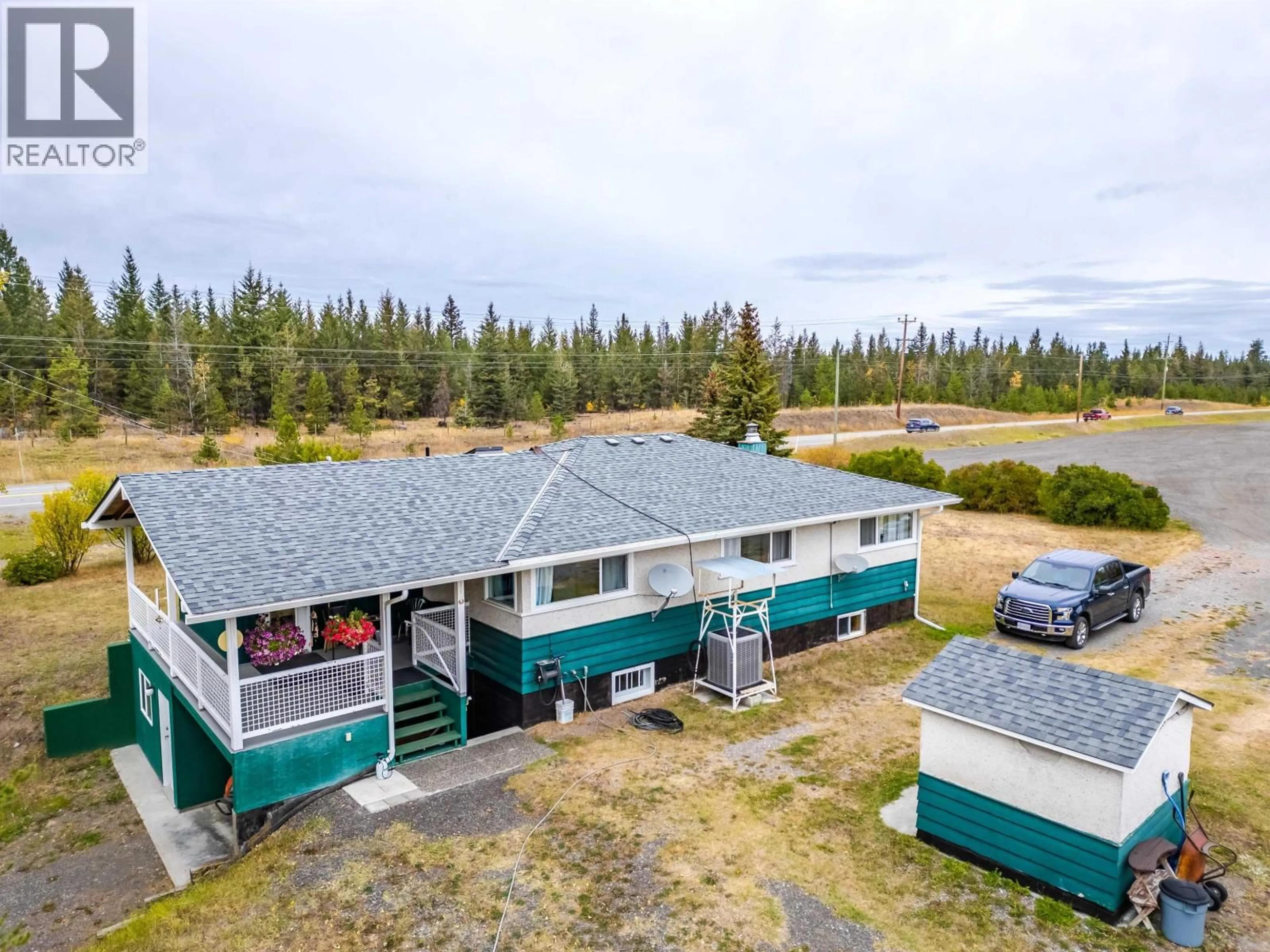 A pic from outside/outdoor area/front of a property/back of a property/a pic from drone, unknown for 1208 CARIBOO 97 HIGHWAY, 70 Mile House British Columbia V0K2K0