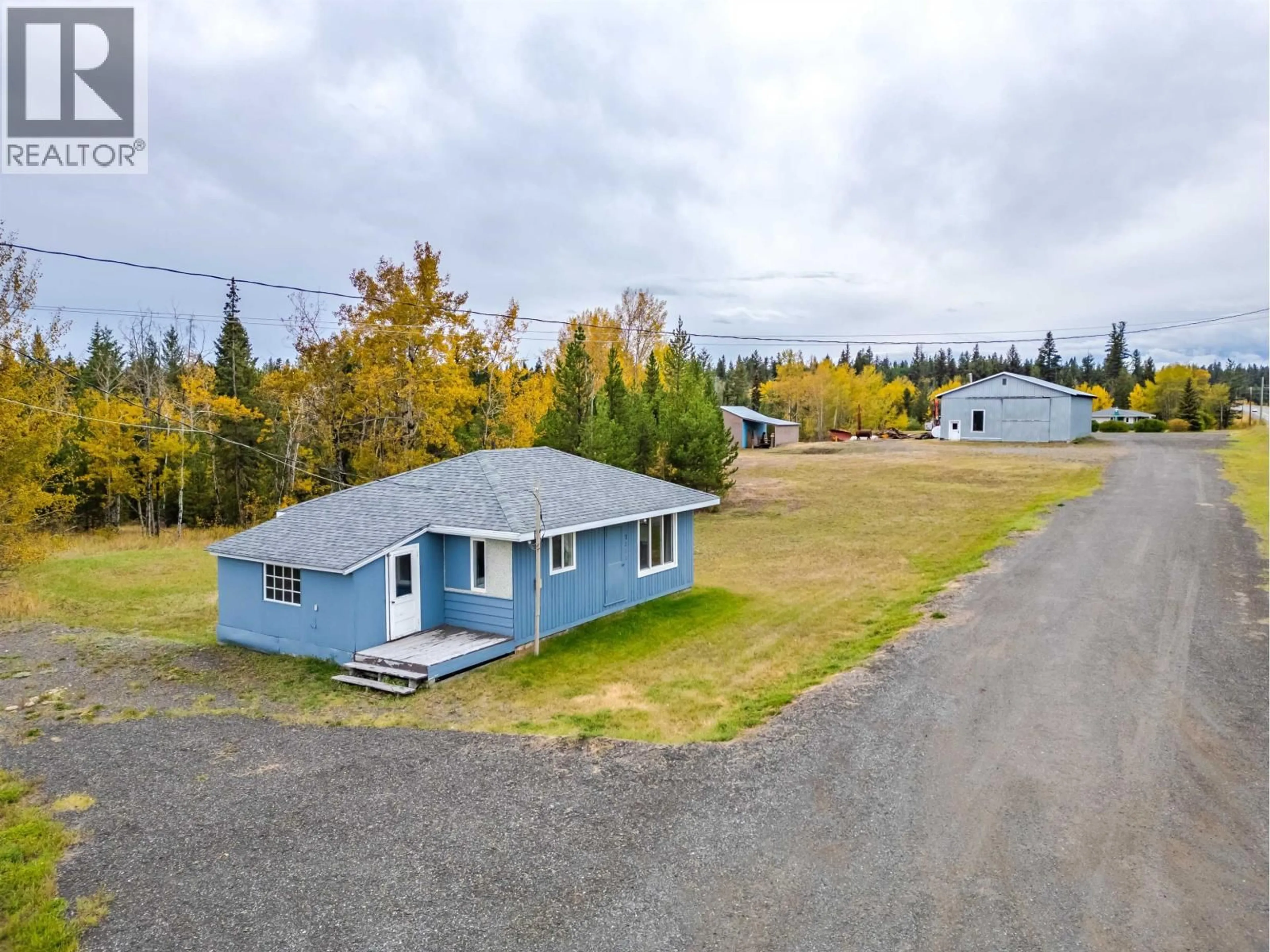 A pic from outside/outdoor area/front of a property/back of a property/a pic from drone, water/lake/river/ocean view for 1208 CARIBOO 97 HIGHWAY, 70 Mile House British Columbia V0K2K0