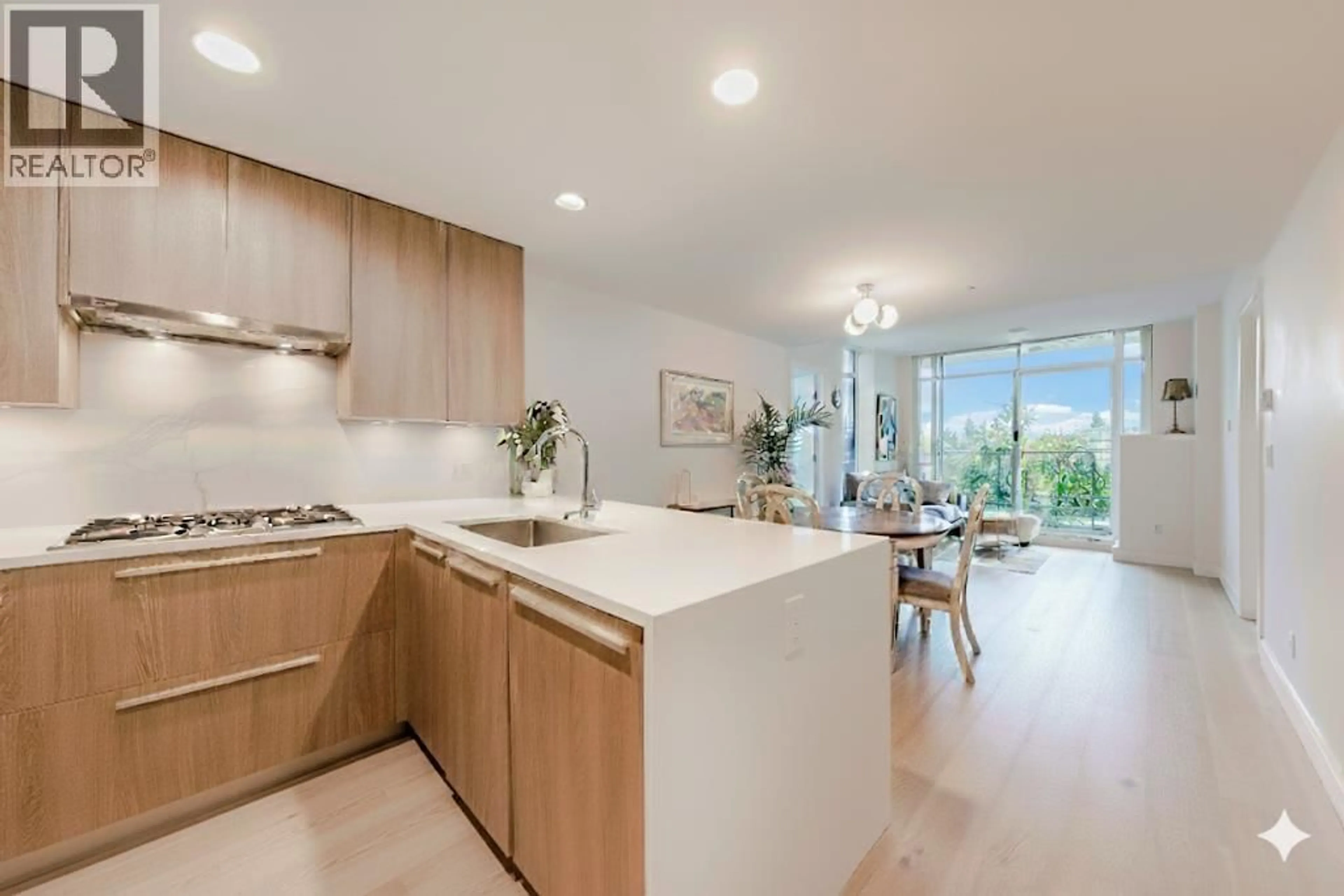 Open concept kitchen, unknown for 205 - 1295 CONIFER STREET, North Vancouver British Columbia V7J0B4