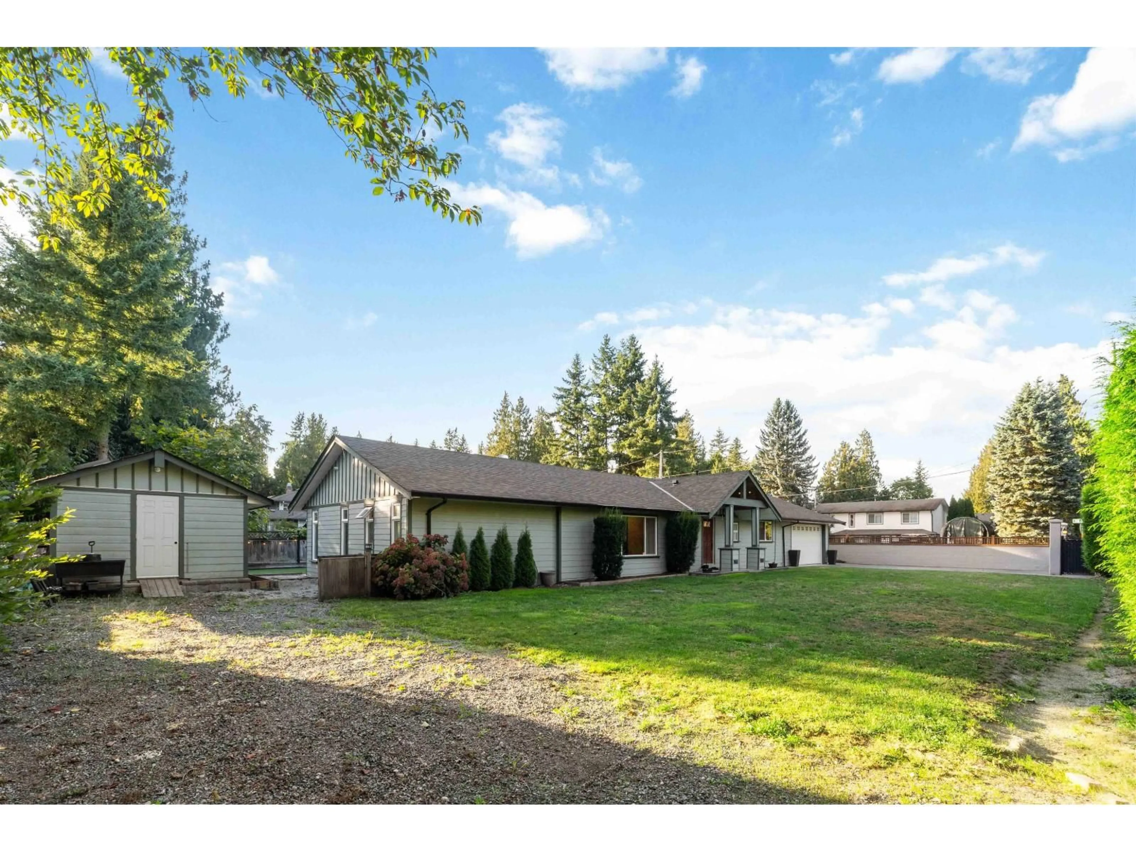 A pic from outside/outdoor area/front of a property/back of a property/a pic from drone, unknown for 3809 207, Langley British Columbia V3A4X5