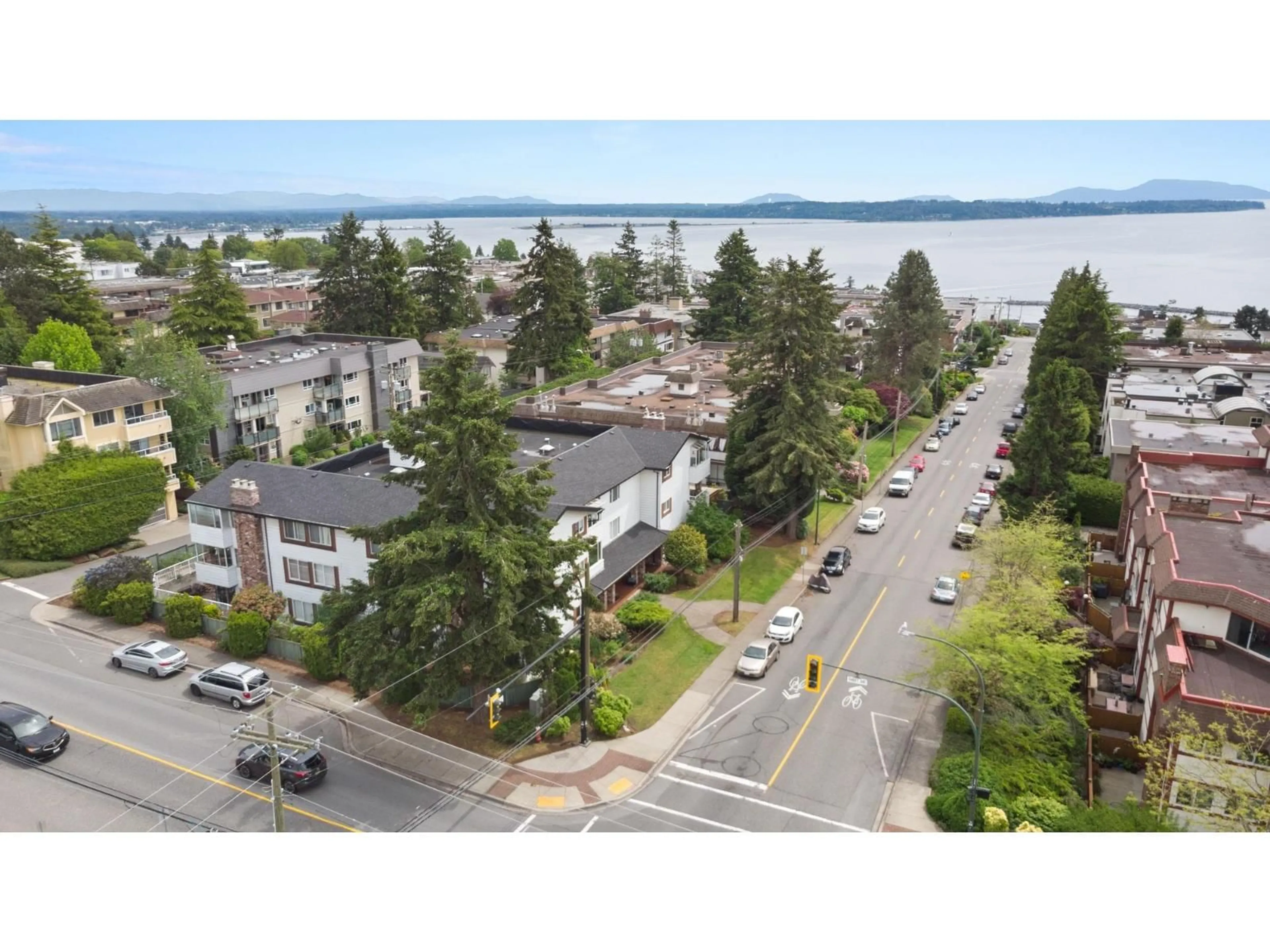 A pic from outside/outdoor area/front of a property/back of a property/a pic from drone, water/lake/river/ocean view for 305 - 1390 MARTIN, White Rock British Columbia V4B3W5