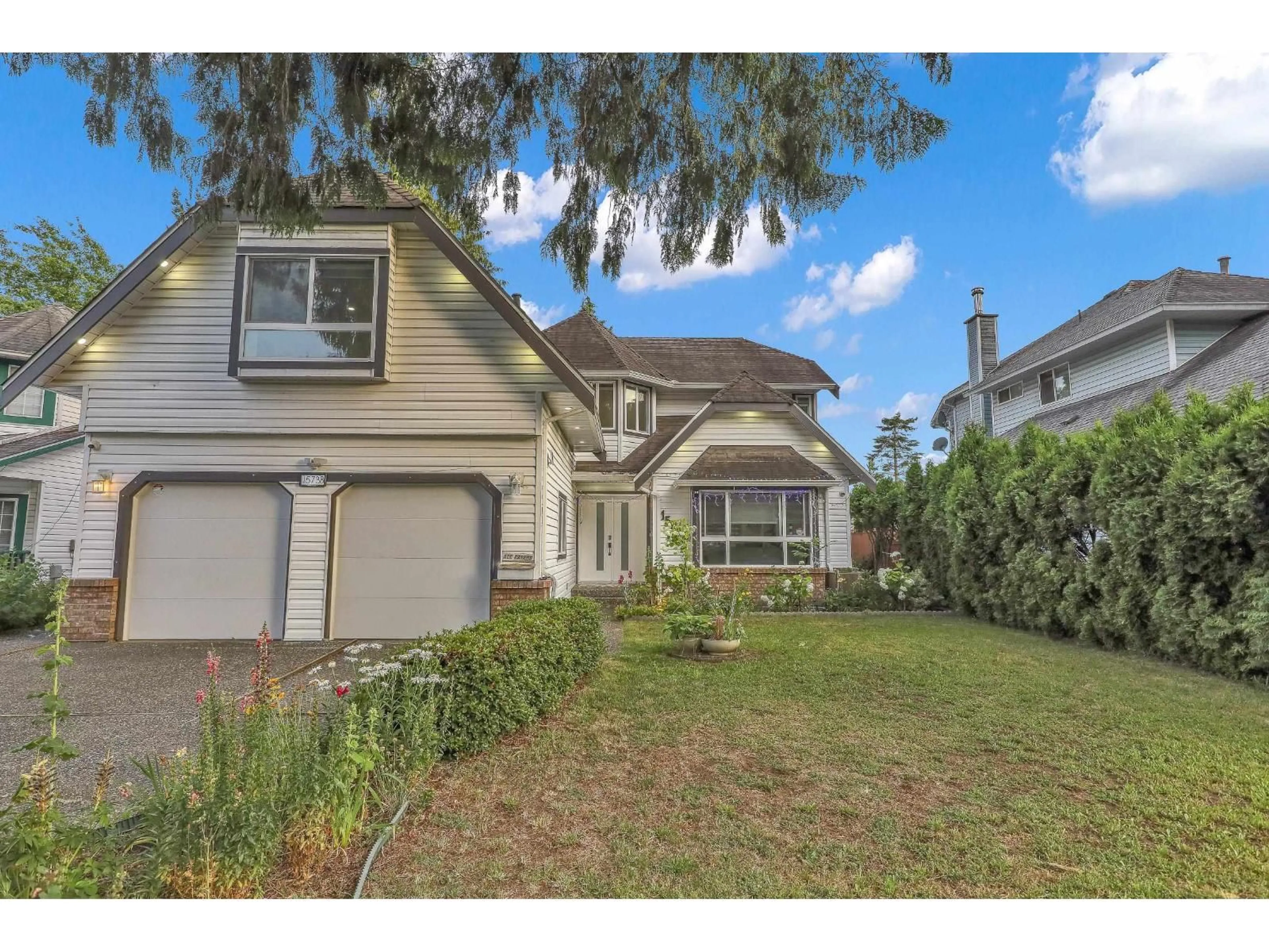 Home with vinyl exterior material, street for 15738 97, Surrey British Columbia V4N2T3