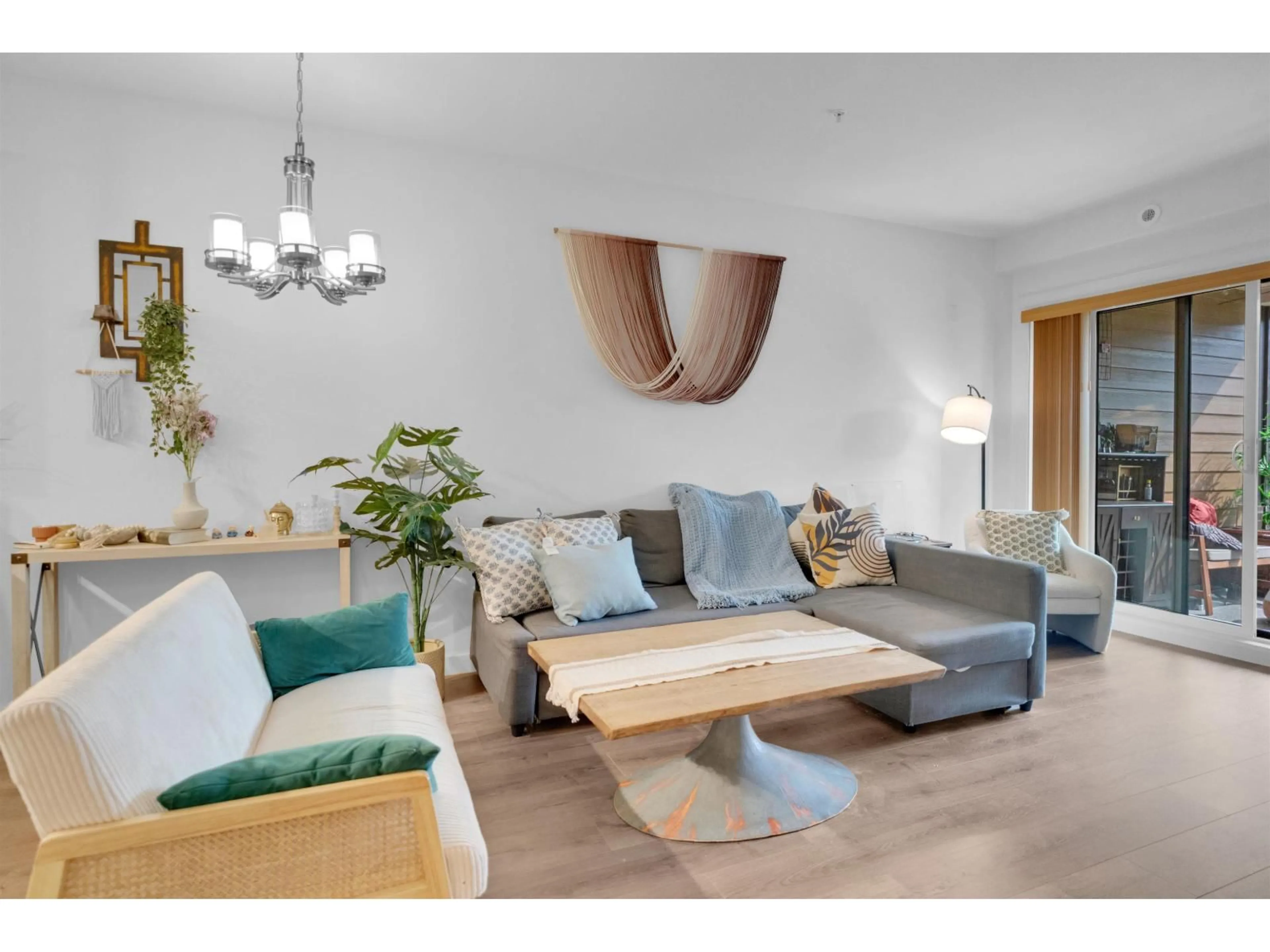 Living room with furniture, wood/laminate floor for 303 - 20376 86, Langley British Columbia V2Y3P8