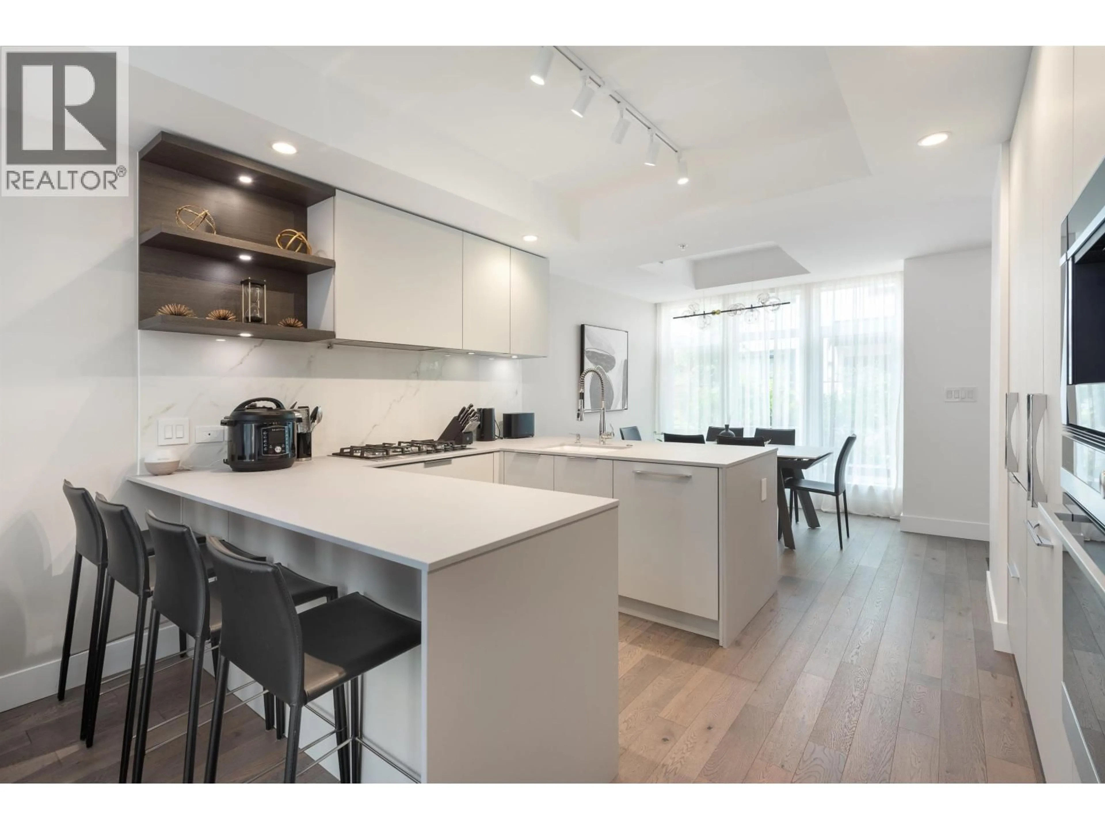 Open concept kitchen, unknown for 124 - 2070 CURLING ROAD, North Vancouver British Columbia V7P0C9