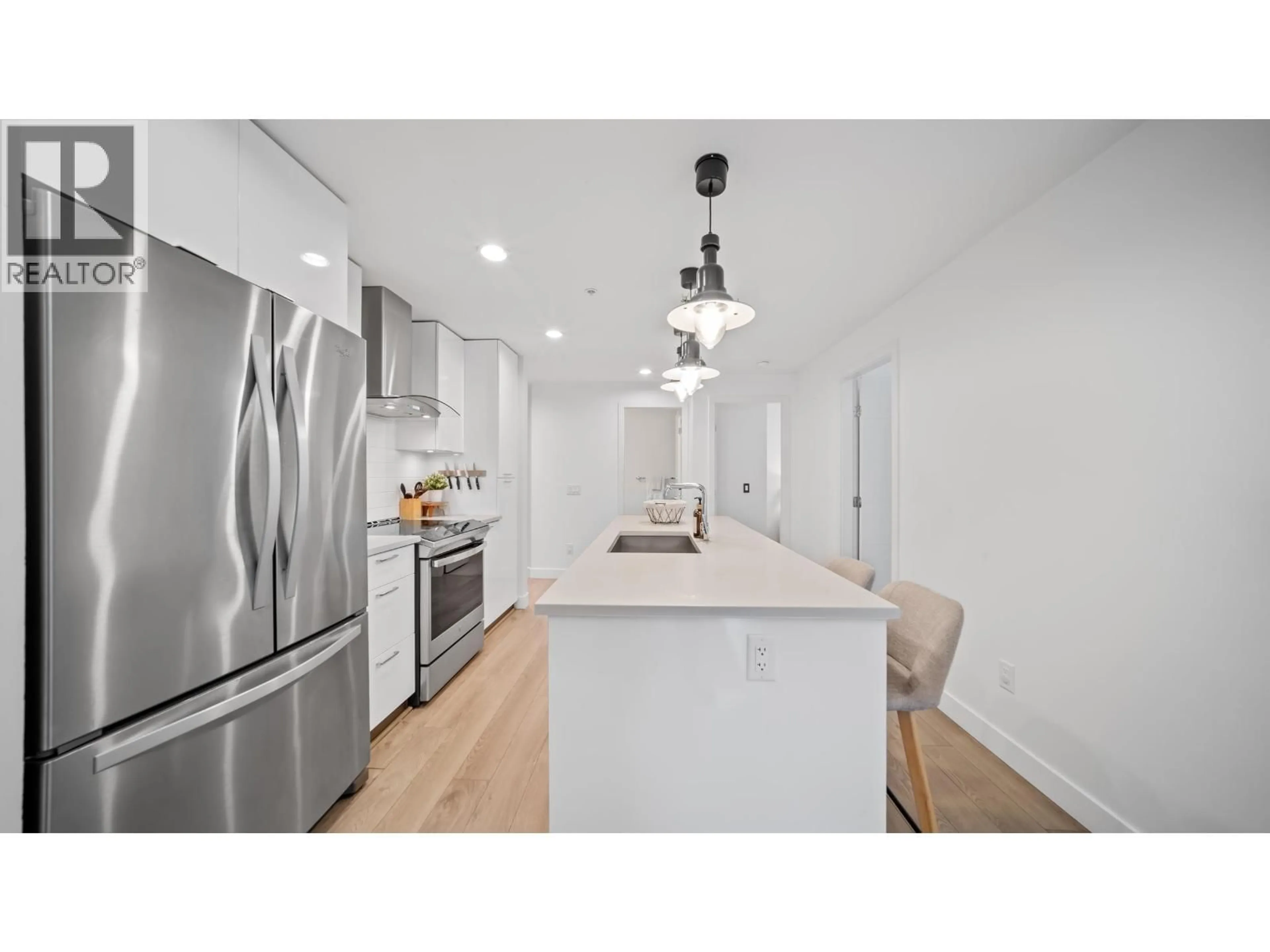 Open concept kitchen, unknown for 204 - 719 3RD STREET, North Vancouver British Columbia V7M0E7
