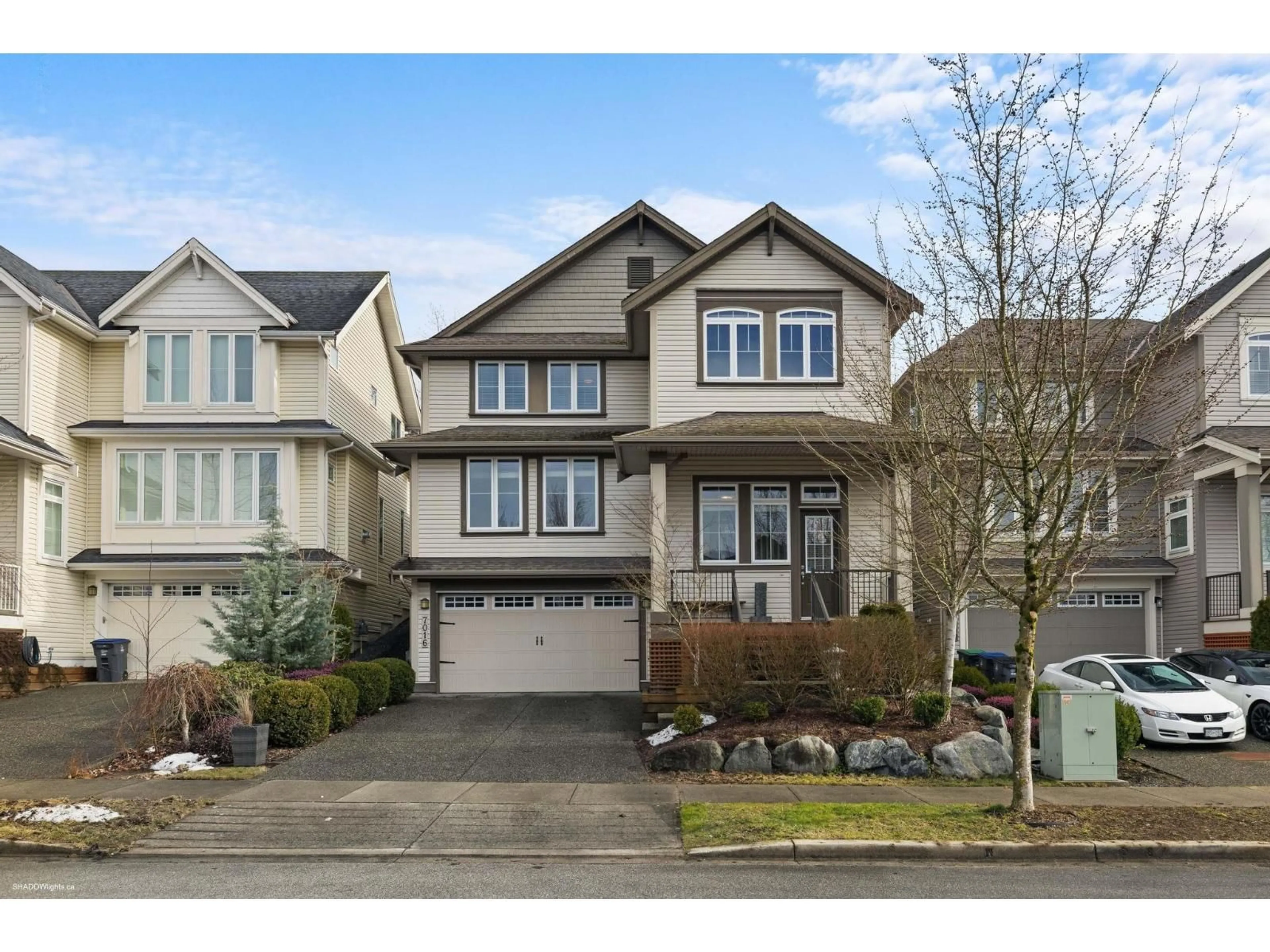 Home with vinyl exterior material, street for 7016 178TH ST, Surrey British Columbia V3S8S2