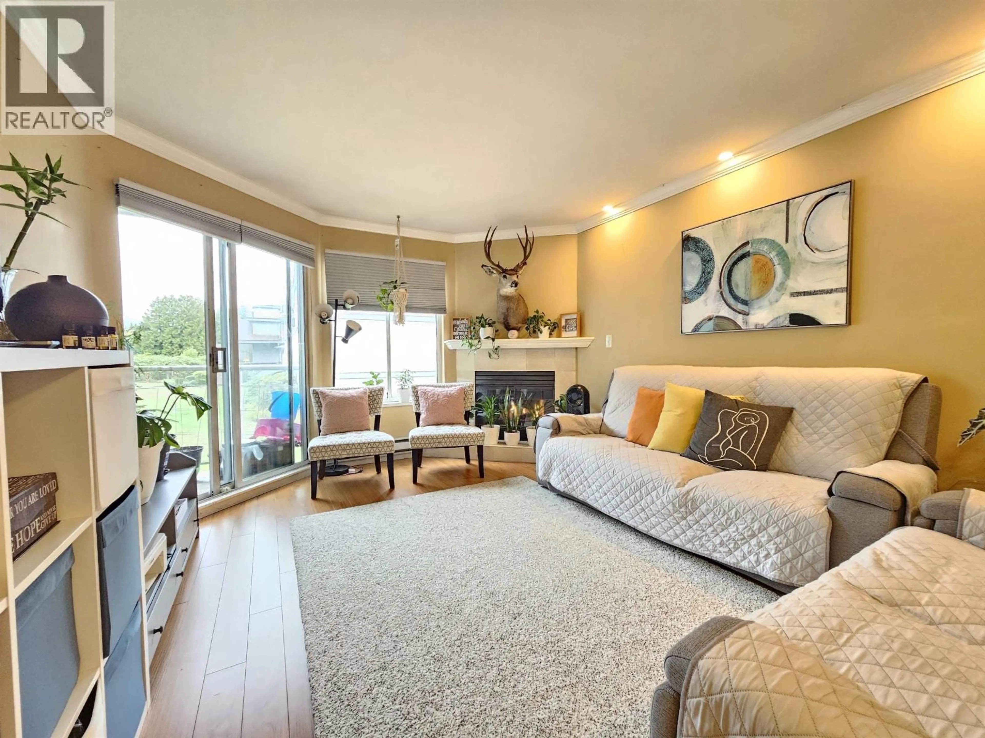 Living room with furniture, unknown for 201 - 1167 PIPELINE ROAD, Coquitlam British Columbia V3B4R9