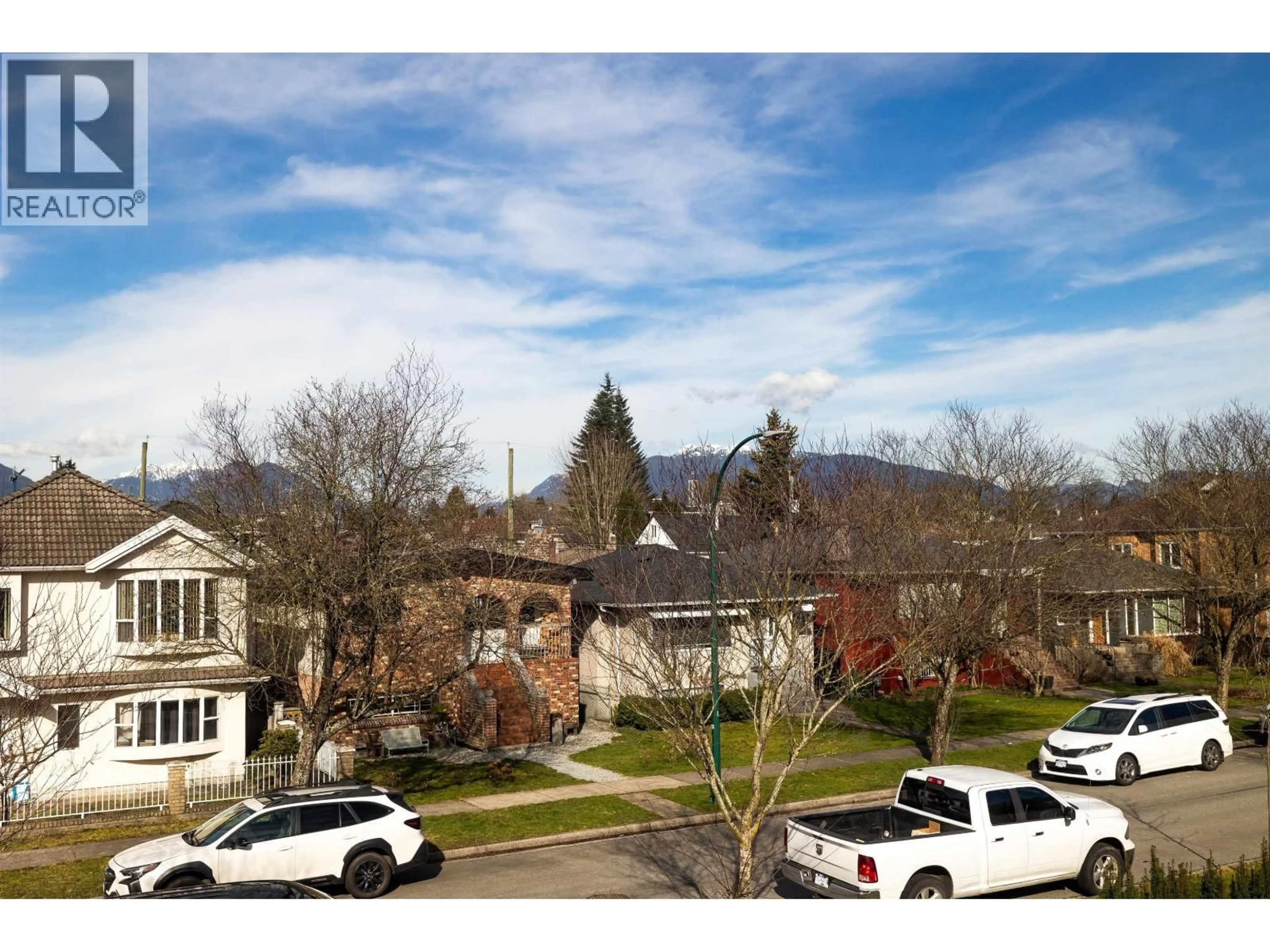 A pic from outside/outdoor area/front of a property/back of a property/a pic from drone, mountain view for 2550 PARKER STREET, Vancouver British Columbia V5K2T3