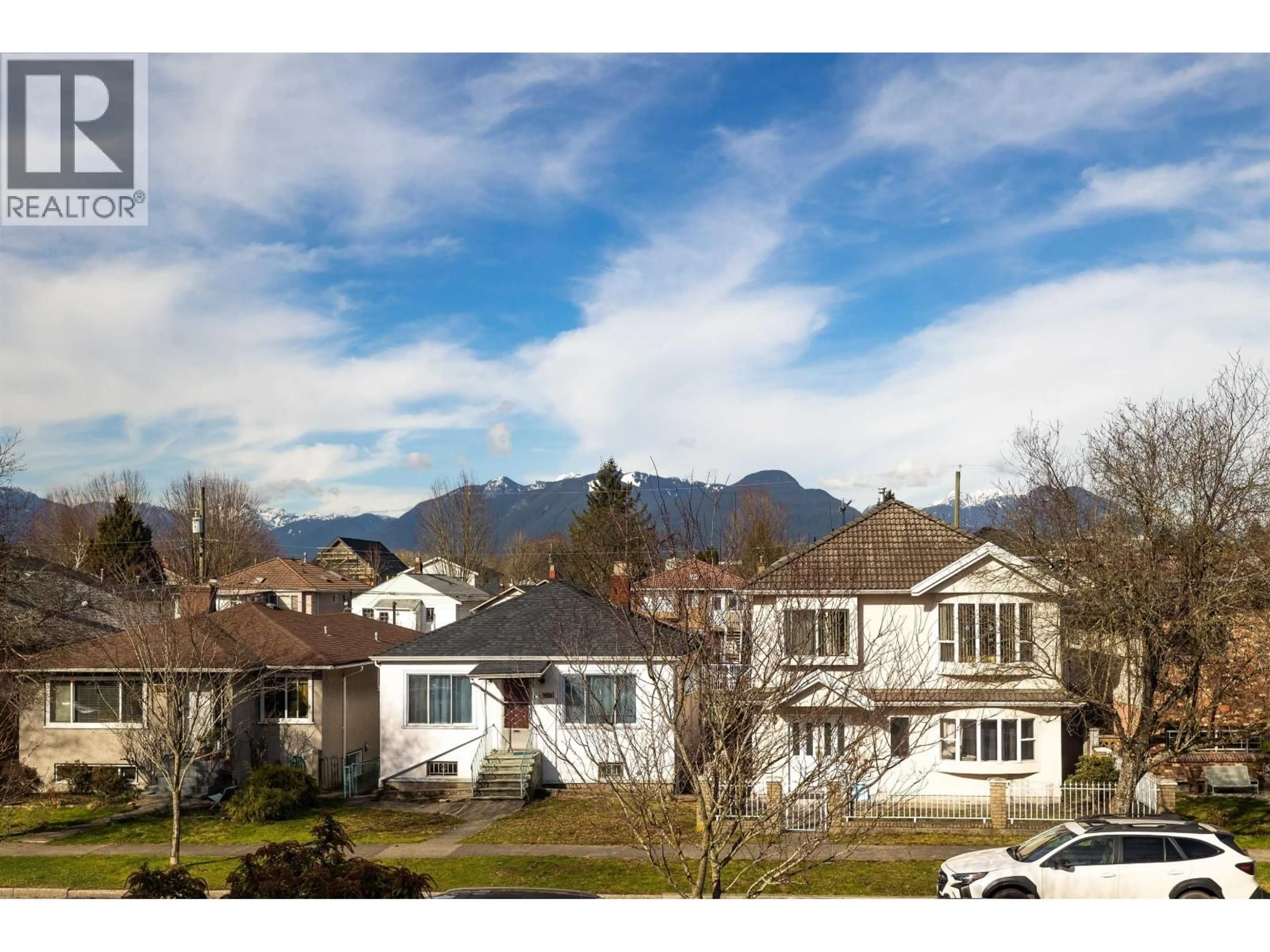 A pic from outside/outdoor area/front of a property/back of a property/a pic from drone, mountain view for 2550 PARKER STREET, Vancouver British Columbia V5K2T3