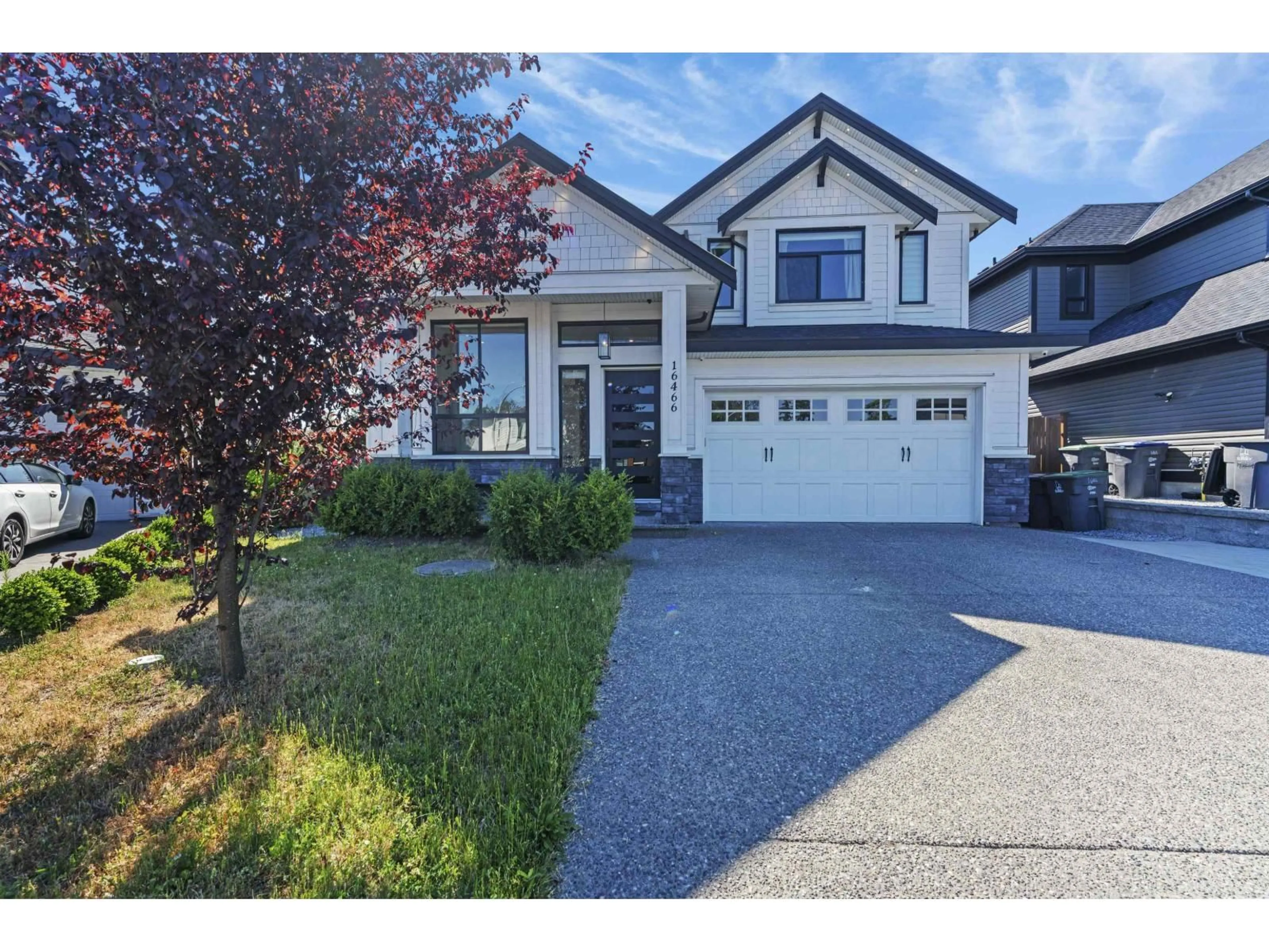 Home with vinyl exterior material, street for 16466 103, Surrey British Columbia V4N1Y6