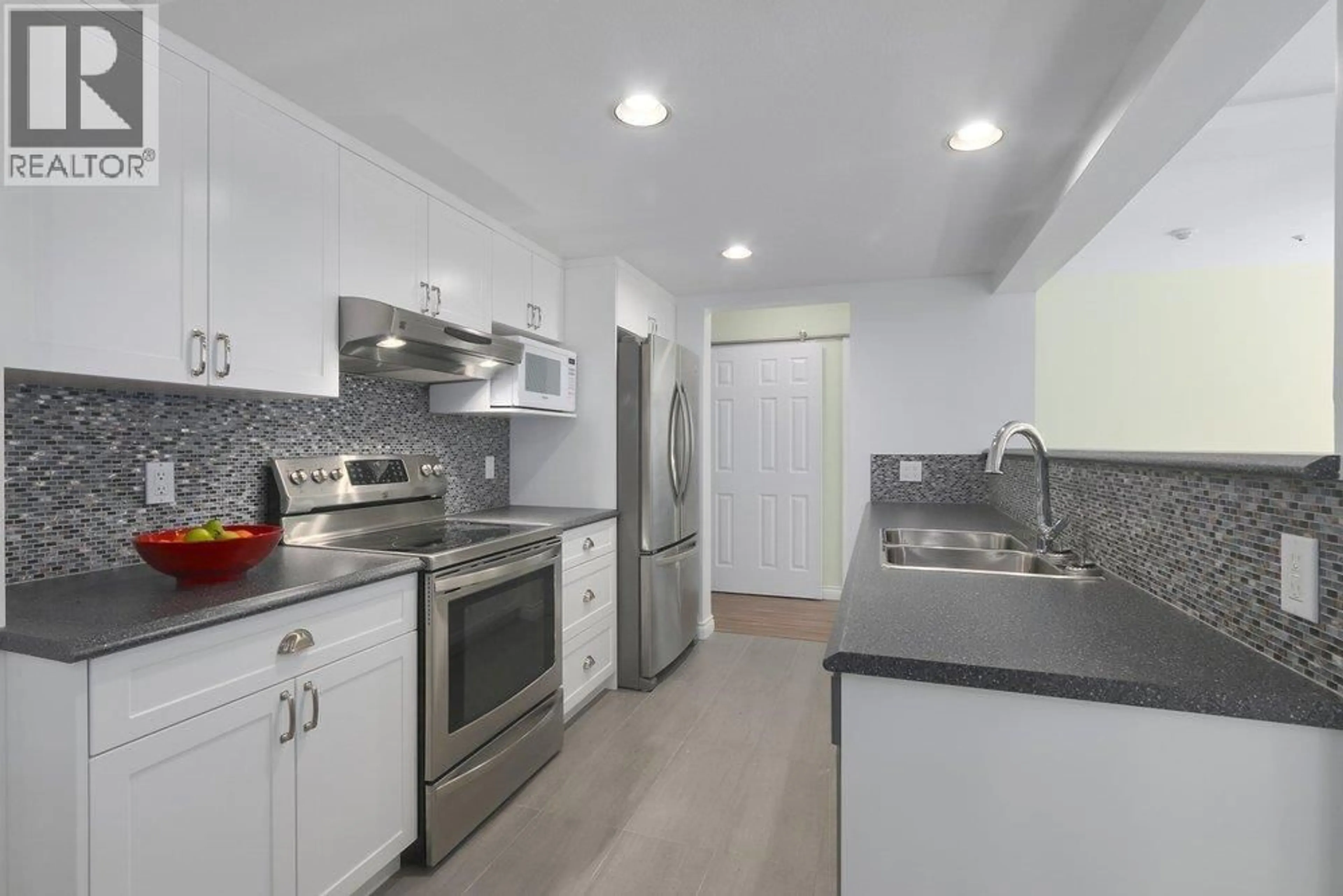 Standard kitchen, ceramic/tile floor for 108 - 3658 BANFF COURT, North Vancouver British Columbia V7H2Z9
