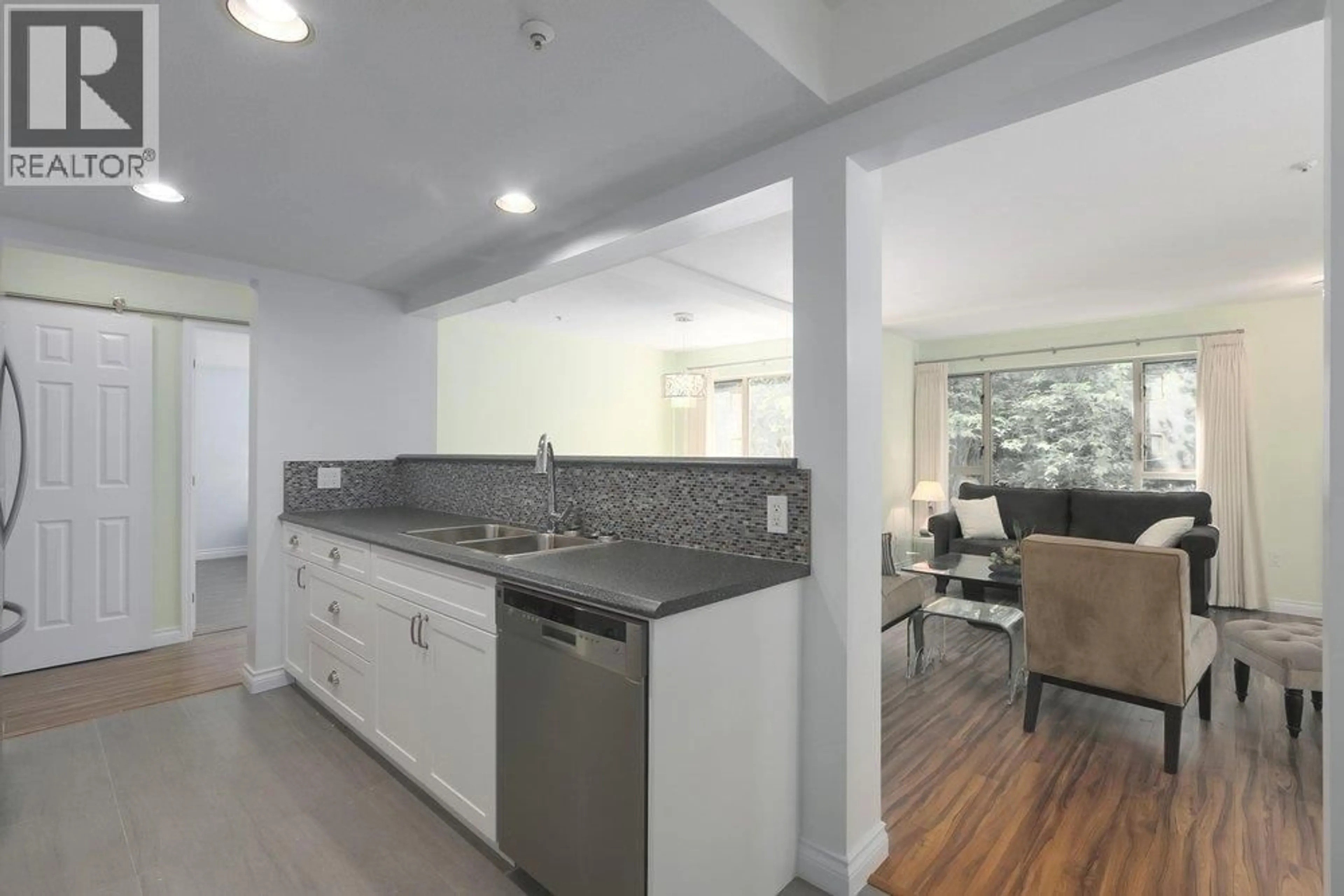 Open concept kitchen, ceramic/tile floor for 108 - 3658 BANFF COURT, North Vancouver British Columbia V7H2Z9