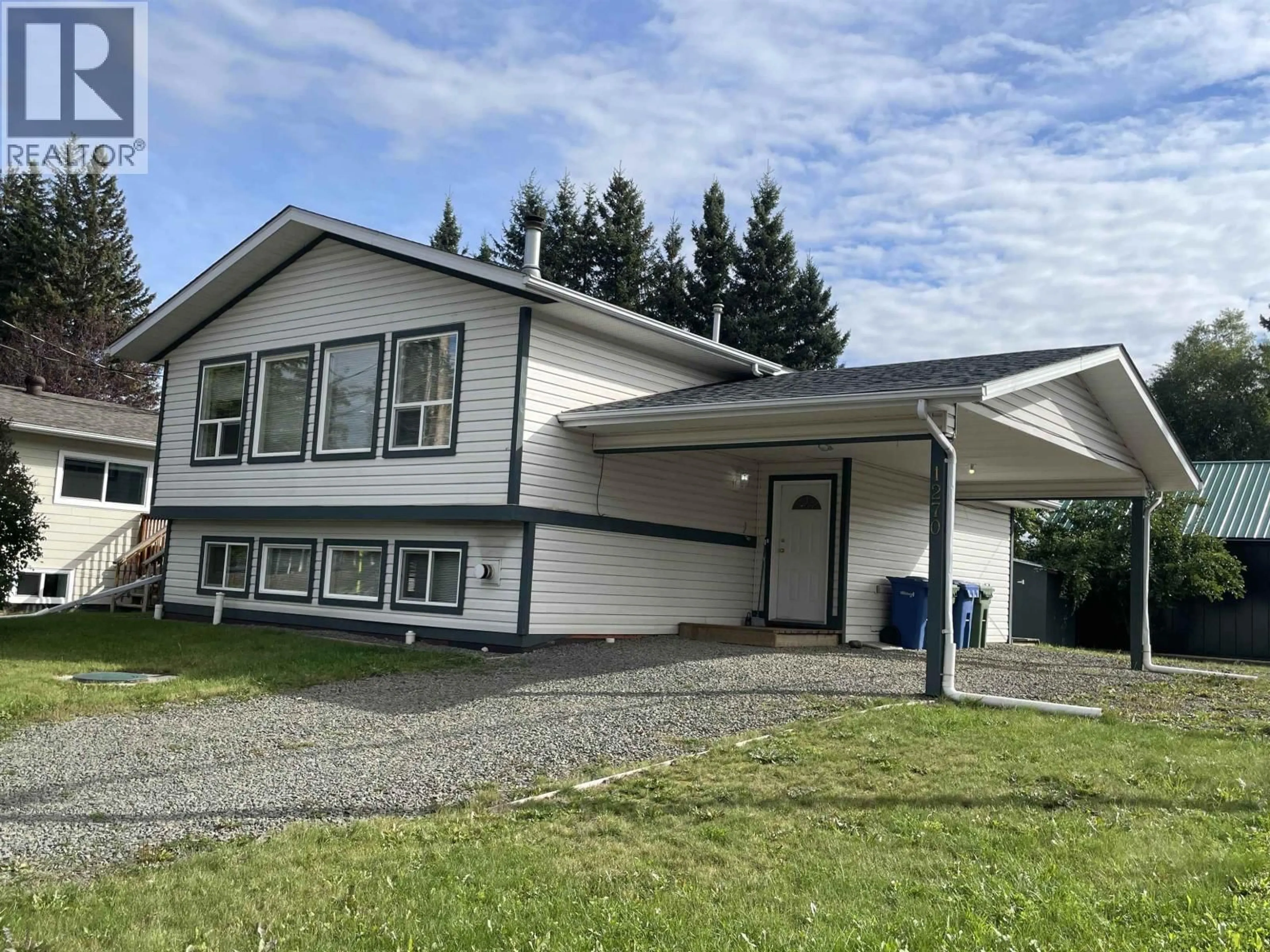 Home with vinyl exterior material, street for 1276 DOMINION STREET, Smithers British Columbia V0J2N0