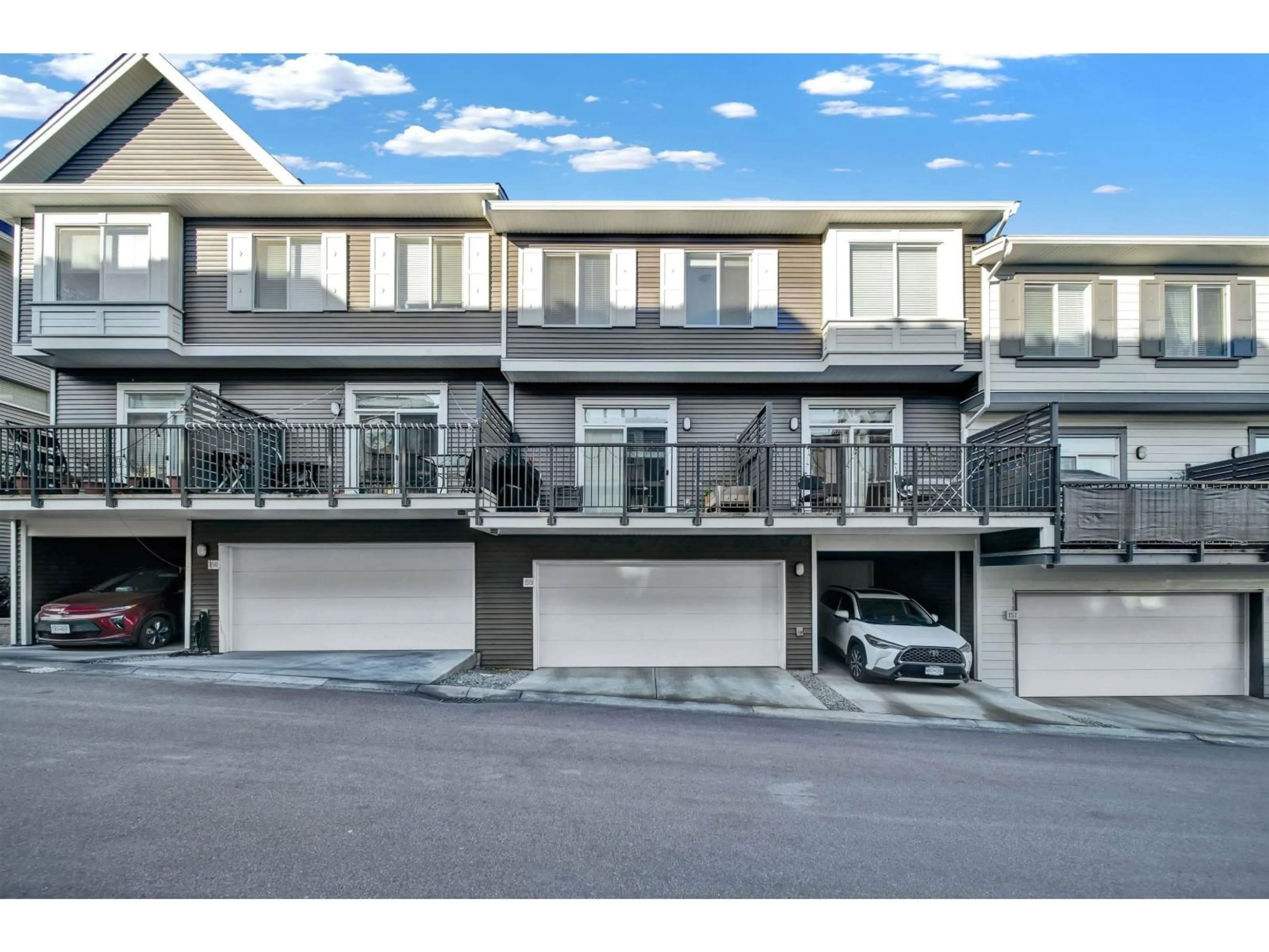 A pic from outside/outdoor area/front of a property/back of a property/a pic from drone, street for 140 - 8168 136A, Surrey British Columbia V3W2Z6