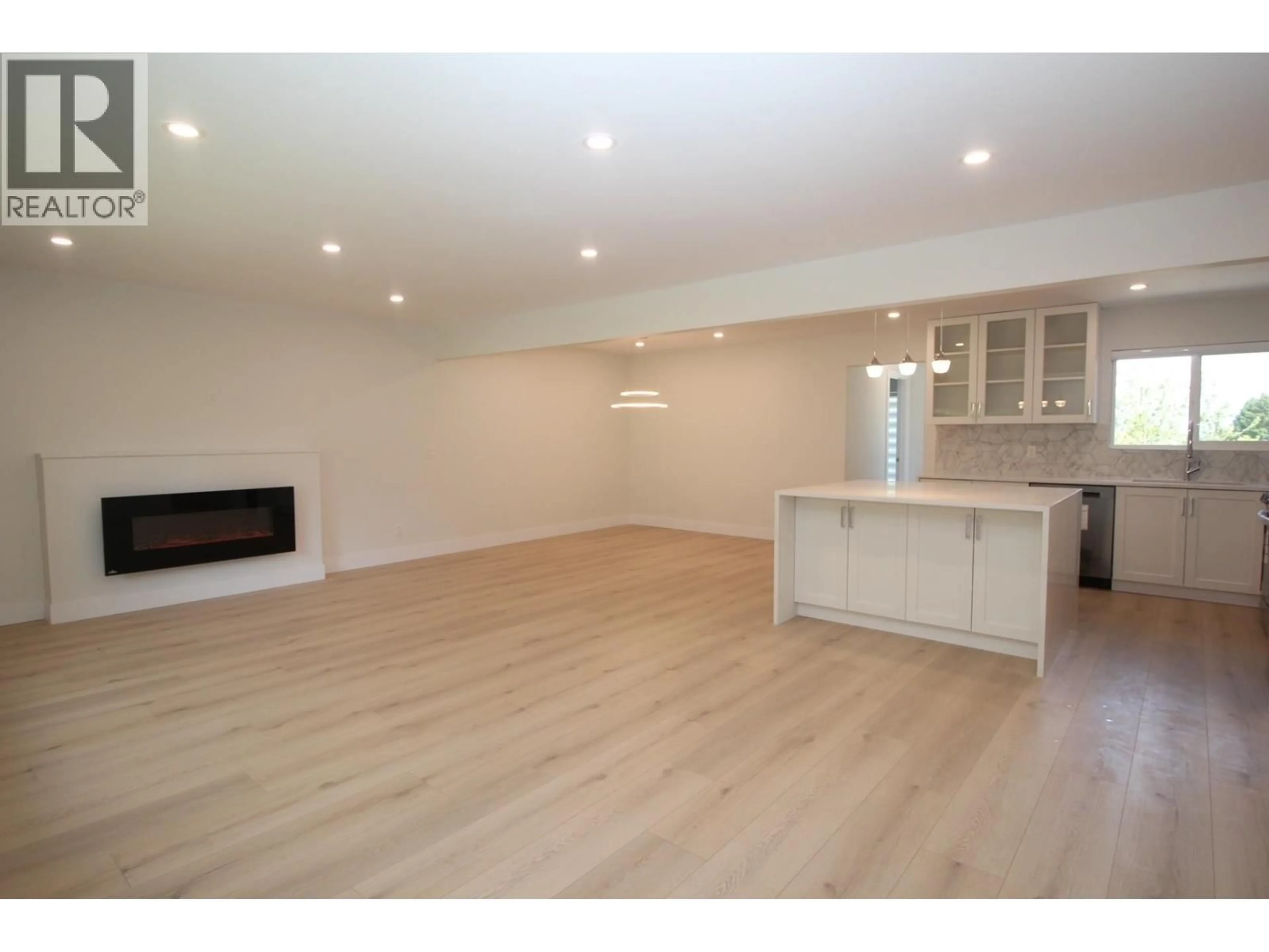 Open concept kitchen, wood/laminate floor for 2076 CLARE PLACE, Port Coquitlam British Columbia V3C1B5