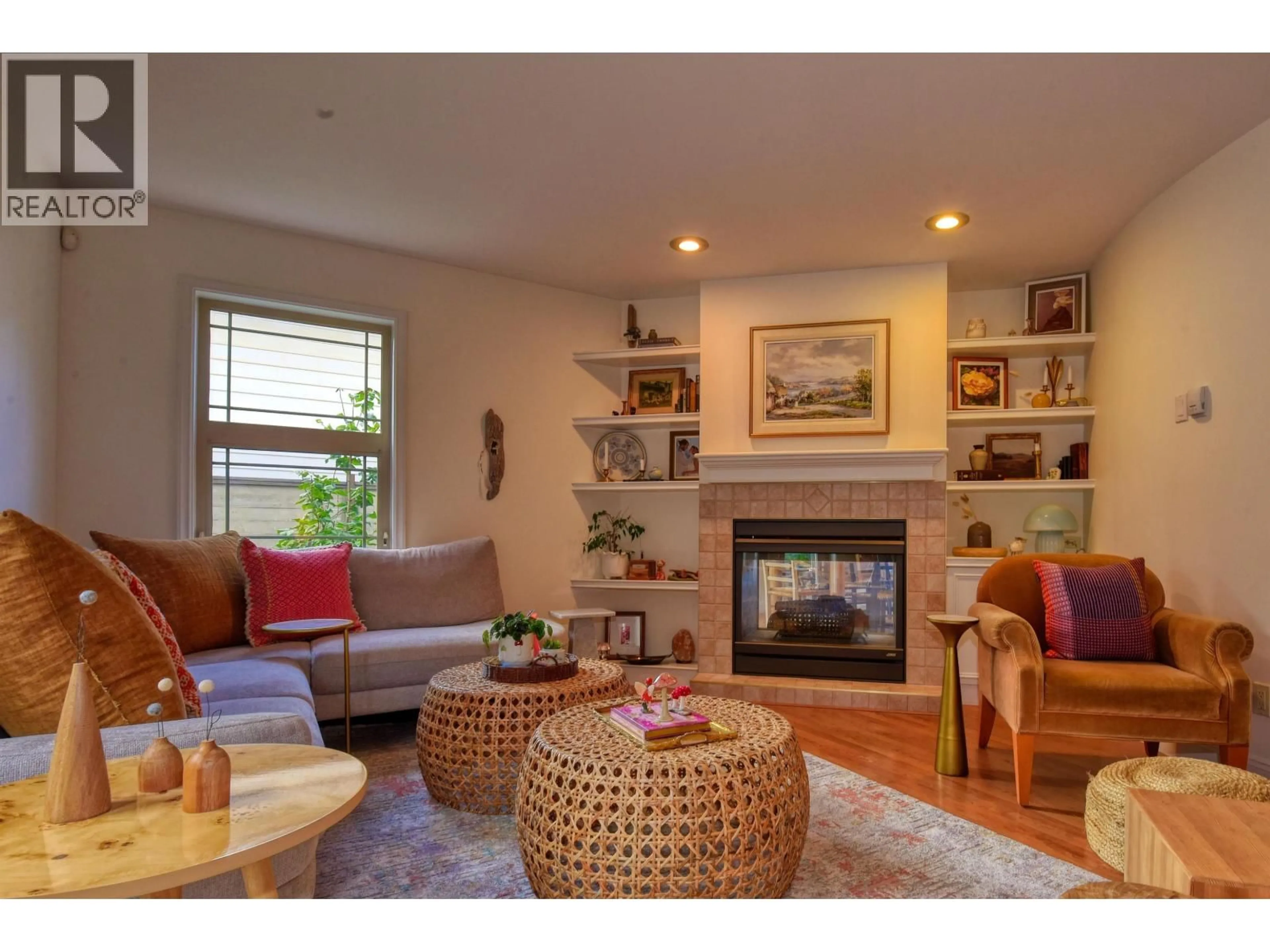 Living room with furniture, wood/laminate floor for 1030 MIDNIGHT DRIVE, Williams Lake British Columbia V2G5K7