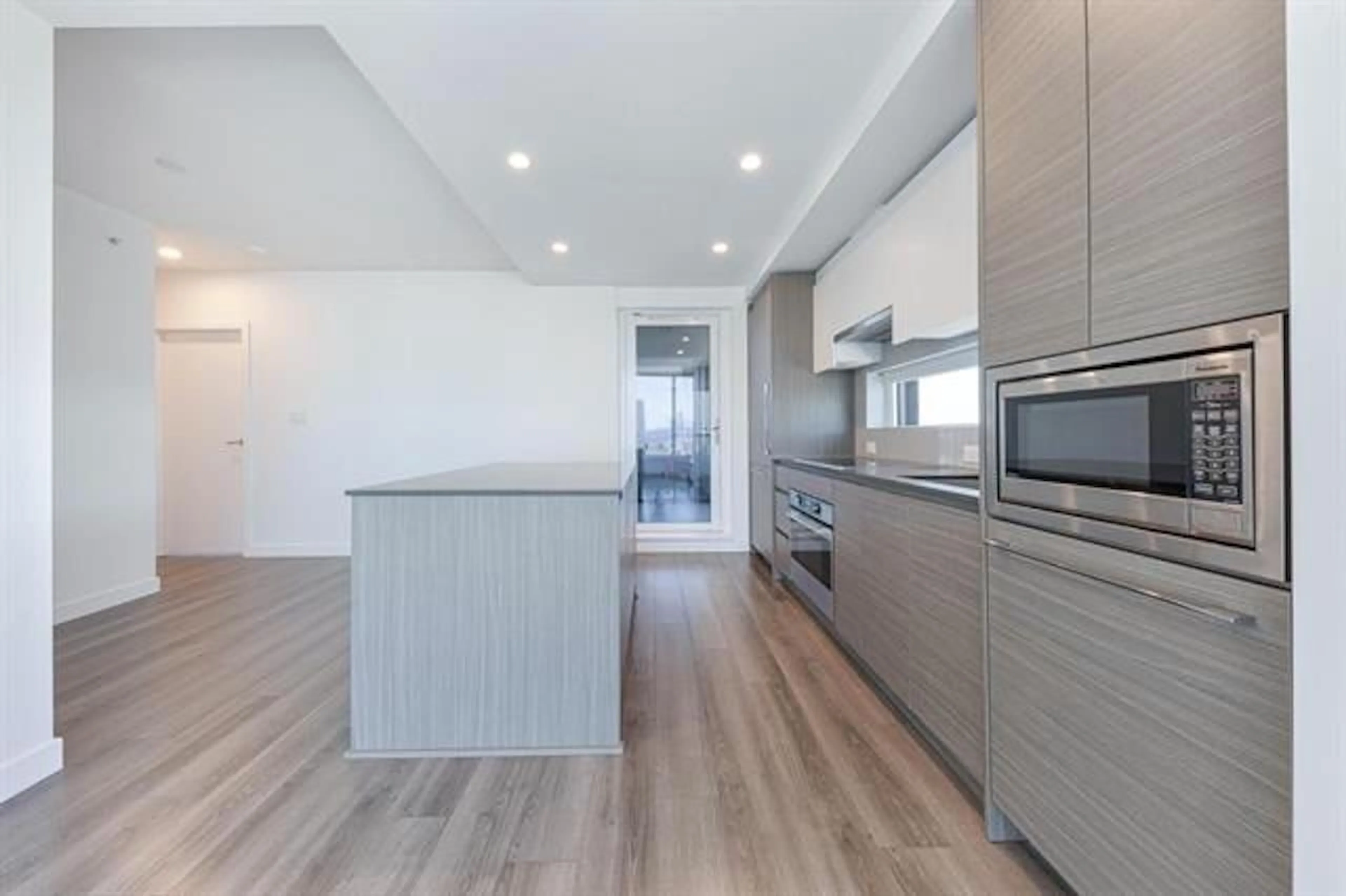 Open concept kitchen, unknown for 2704 - 13615 FRASER, Surrey British Columbia V3T0P7