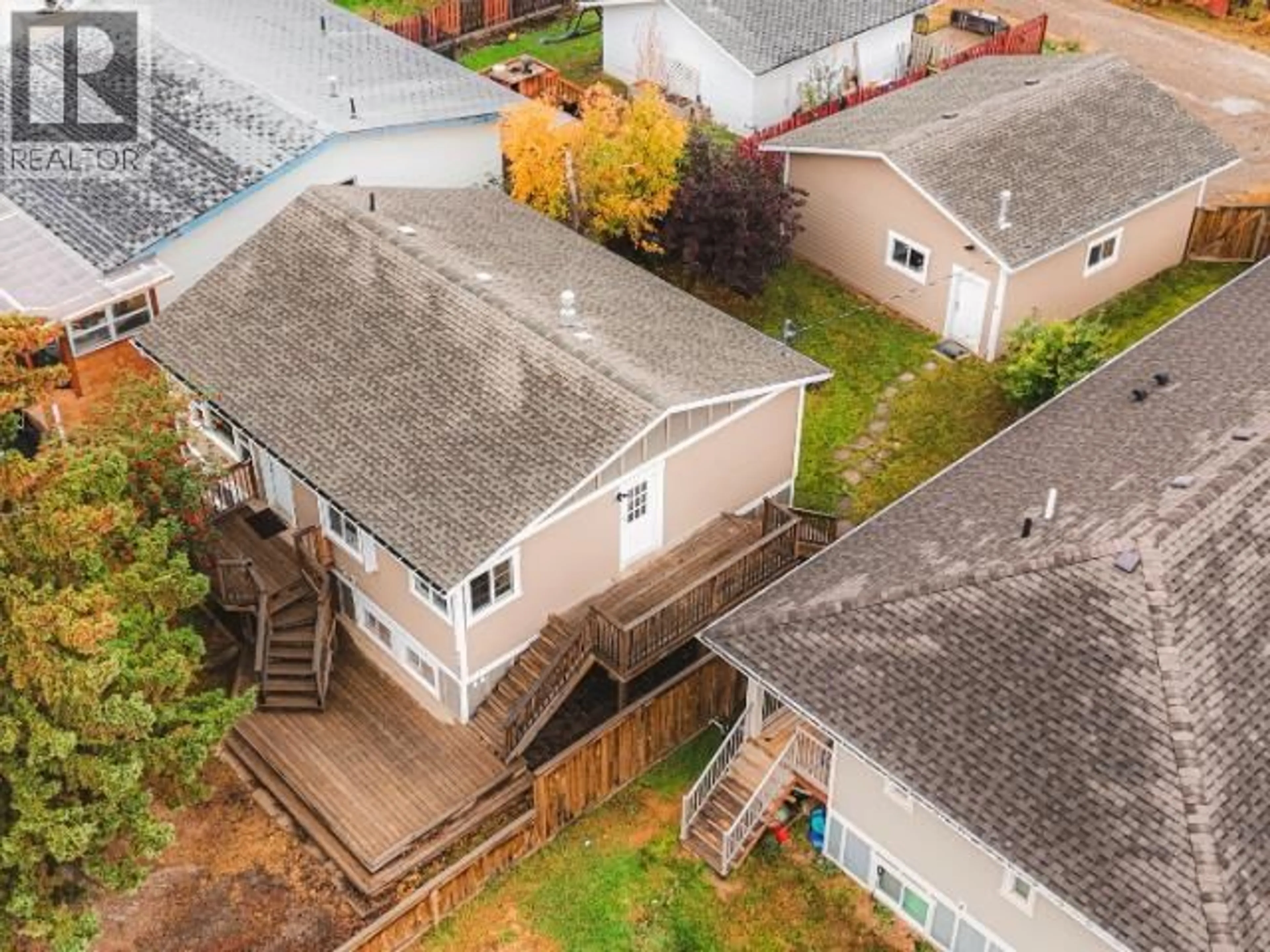 A pic from outside/outdoor area/front of a property/back of a property/a pic from drone, unknown for 8408 97 AVENUE, Fort St. John British Columbia V1J1M4