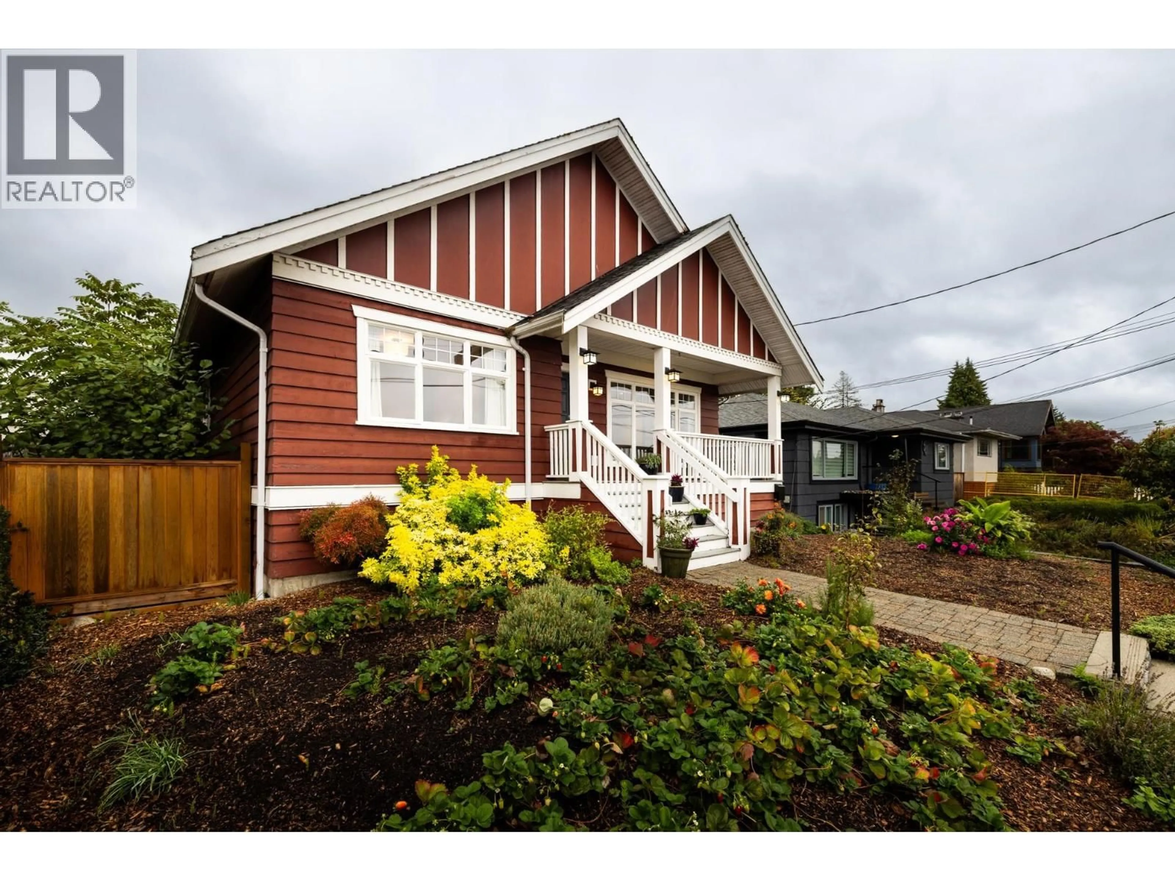 Home with vinyl exterior material, street for 518 7TH STREET, North Vancouver British Columbia V7L1S3