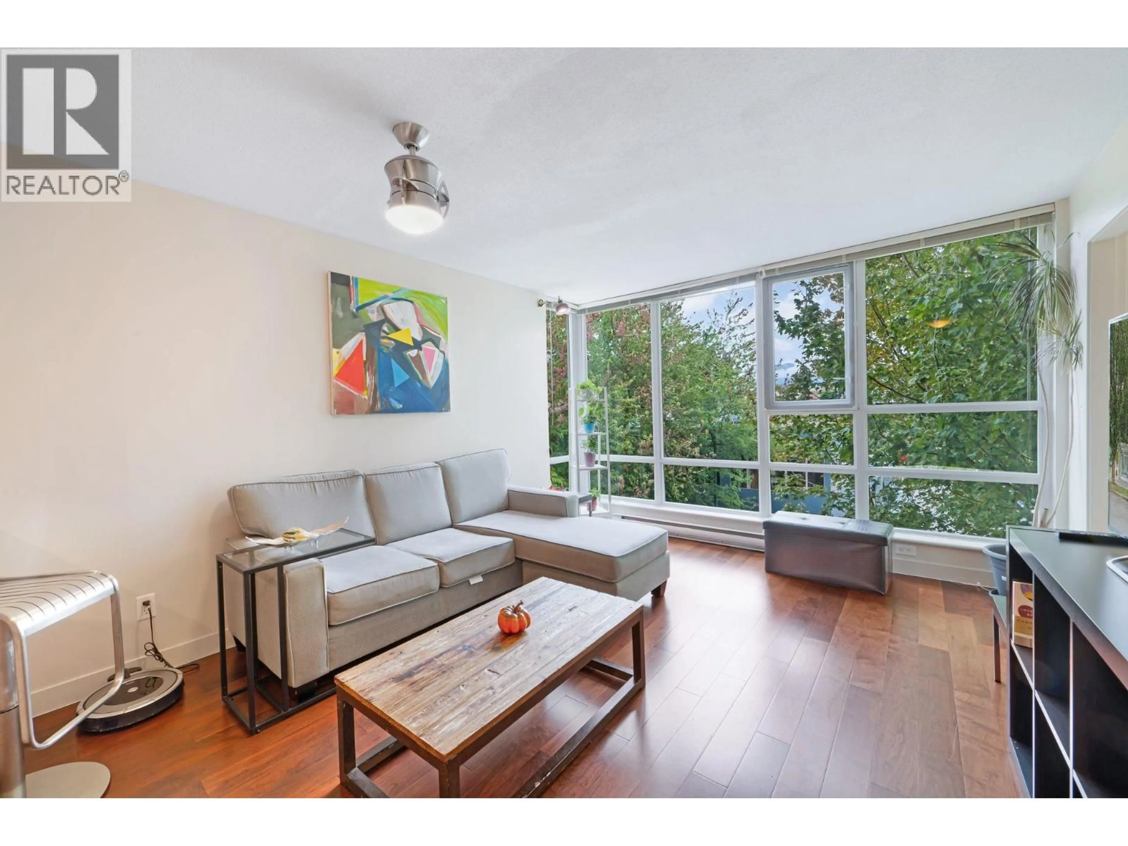 Living room with furniture, wood/laminate floor for 302 - 1808 3RD AVENUE, Vancouver British Columbia V6J0C4