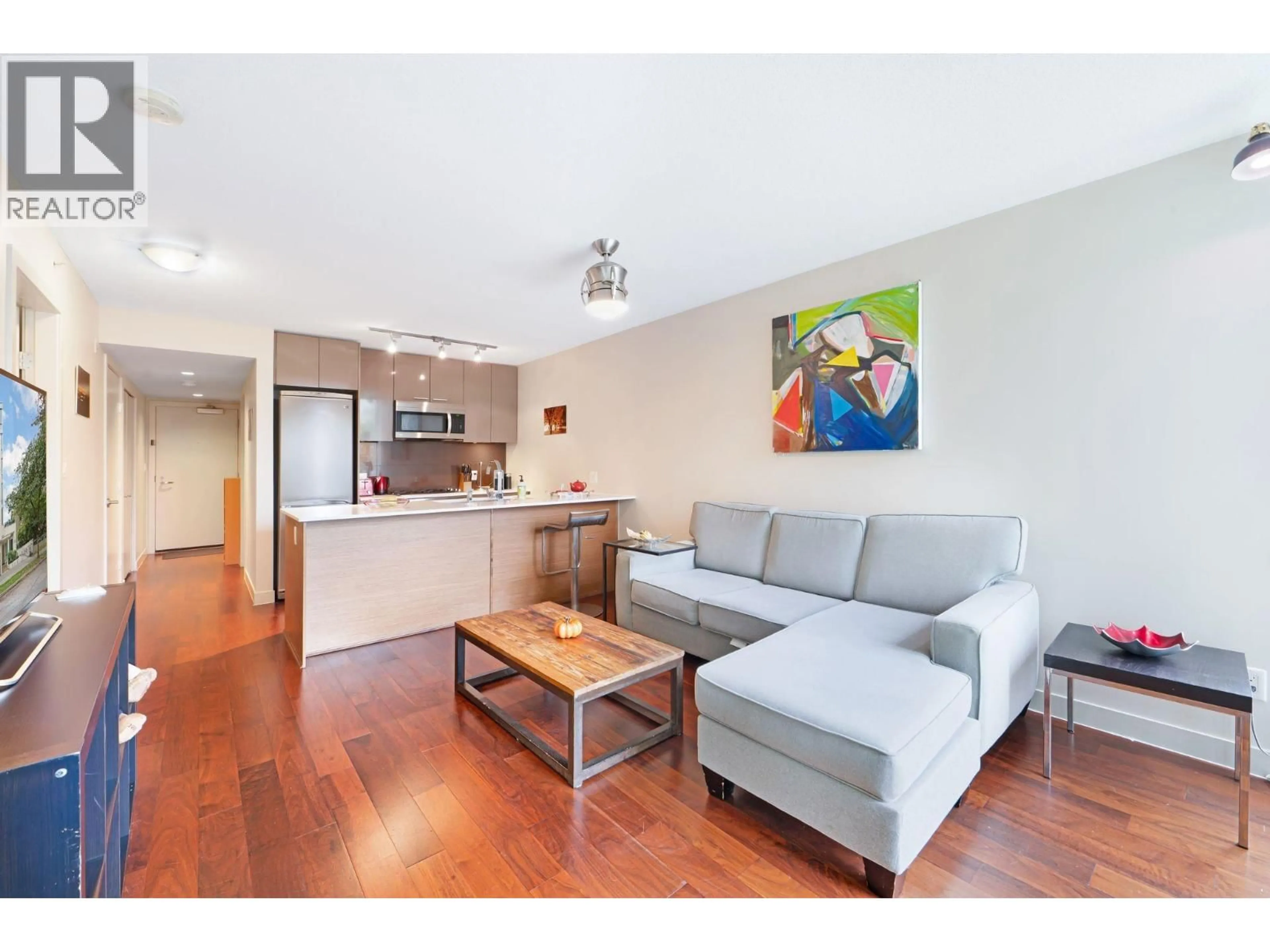 Living room with furniture, wood/laminate floor for 302 - 1808 3RD AVENUE, Vancouver British Columbia V6J0C4