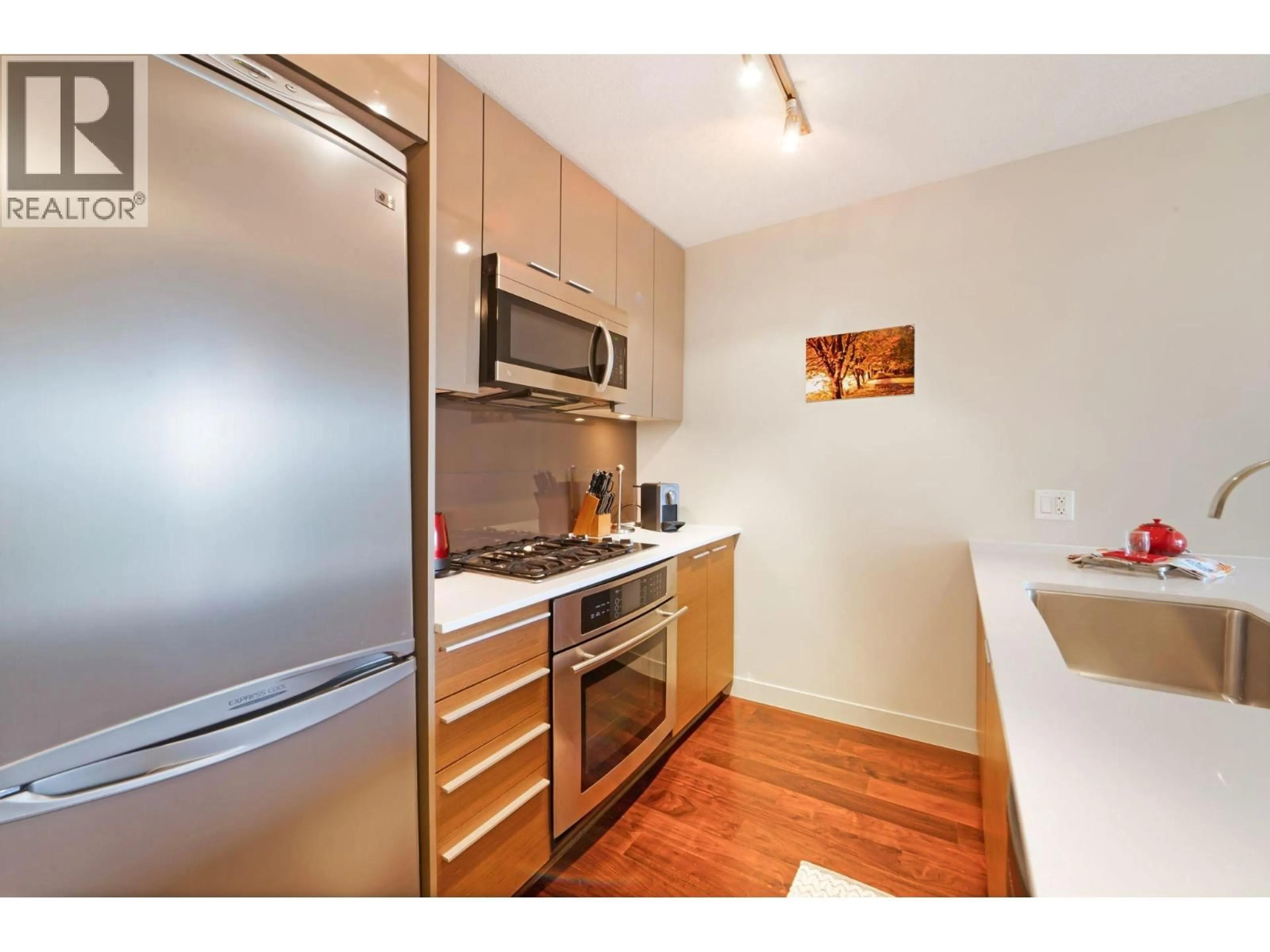 Standard kitchen, wood/laminate floor for 302 - 1808 3RD AVENUE, Vancouver British Columbia V6J0C4