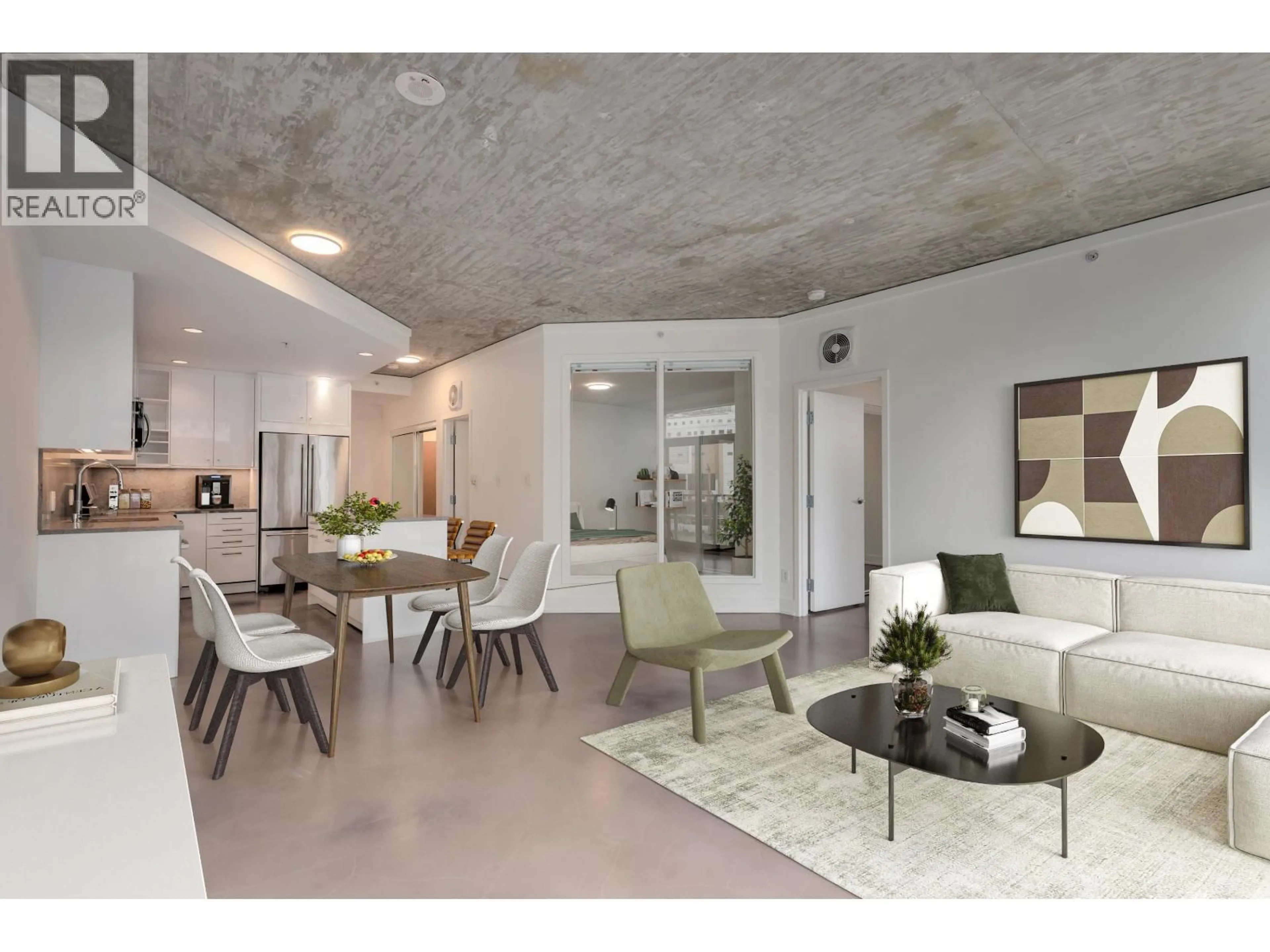 Living room with furniture, cement floor for 604 - 919 STATION STREET, Vancouver British Columbia V6A4L9