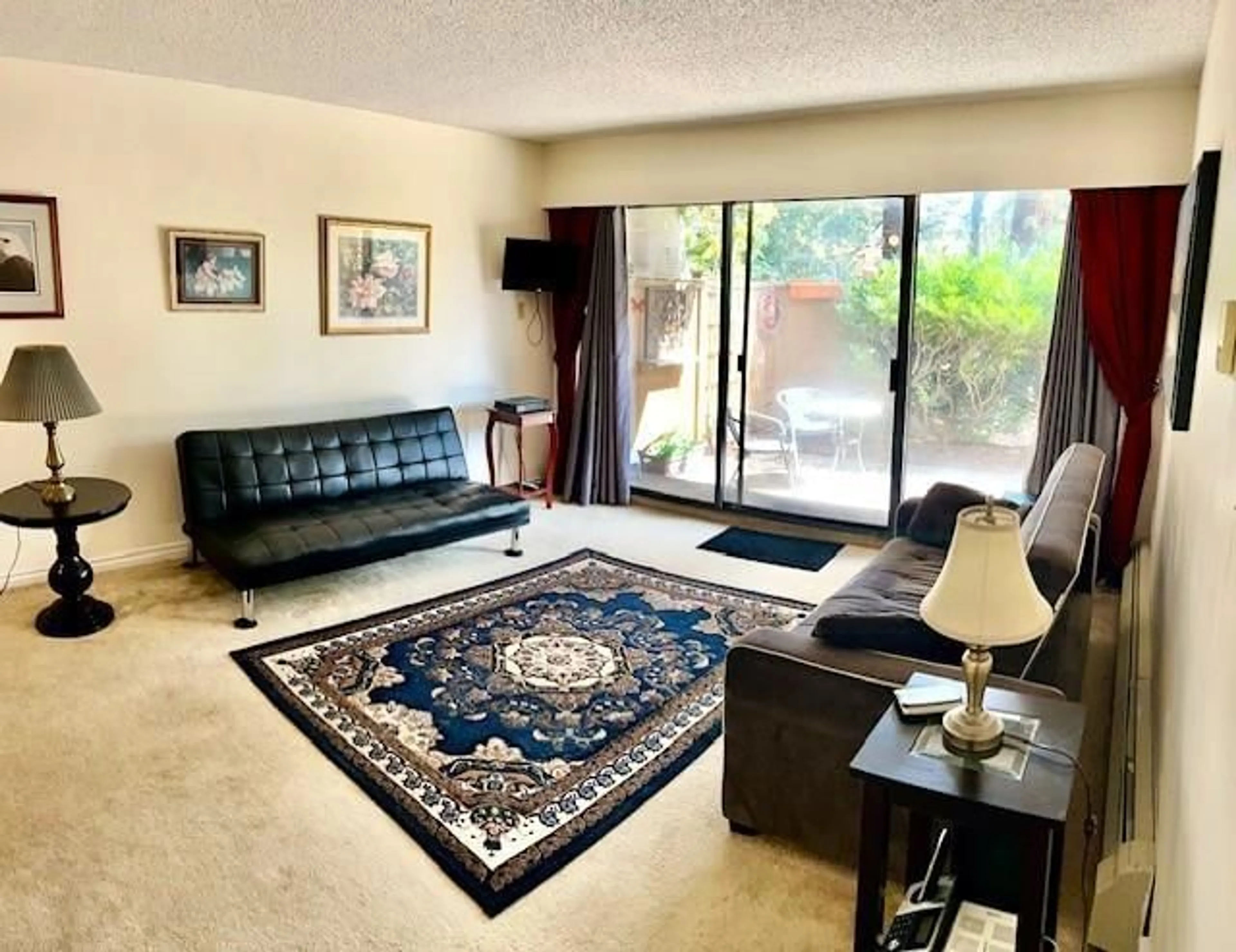 Living room with furniture, carpet floor for 110 - 14935 100, Surrey British Columbia V3R1J6