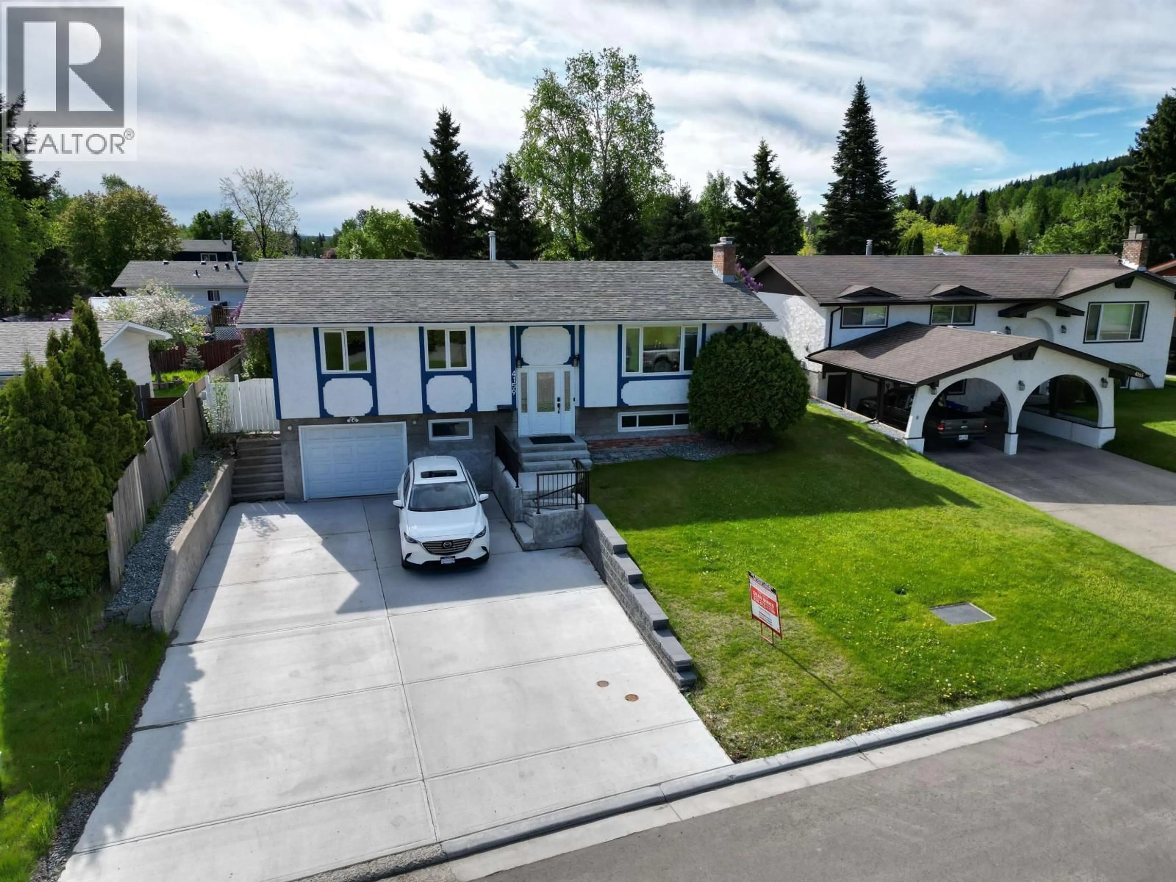A pic from outside/outdoor area/front of a property/back of a property/a pic from drone, street for 4159 NEHRING AVENUE, Prince George British Columbia V2N3E9