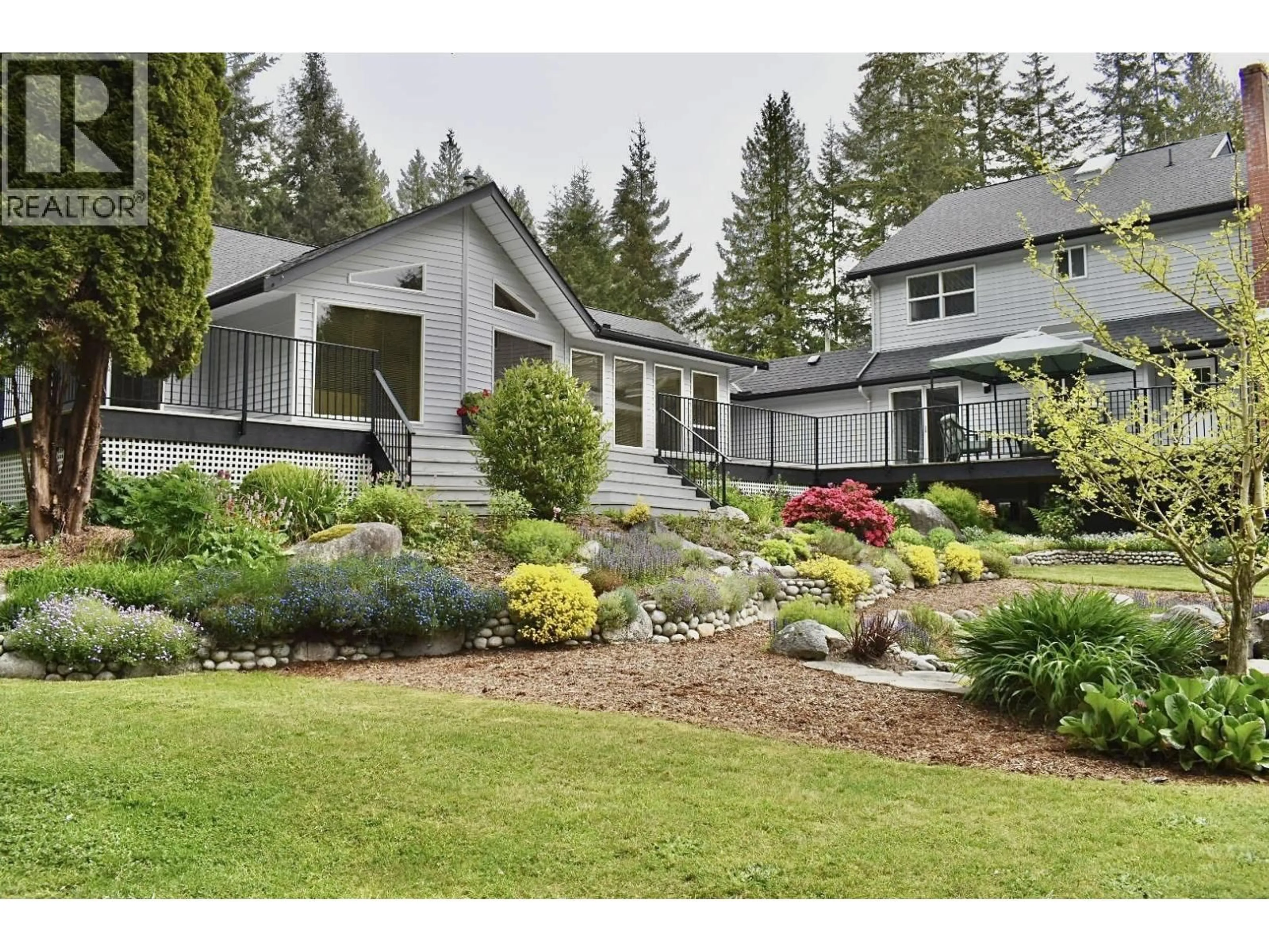 Home with vinyl exterior material, mountain view for 1499 HANBURY ROAD, Roberts Creek British Columbia V0N2W1