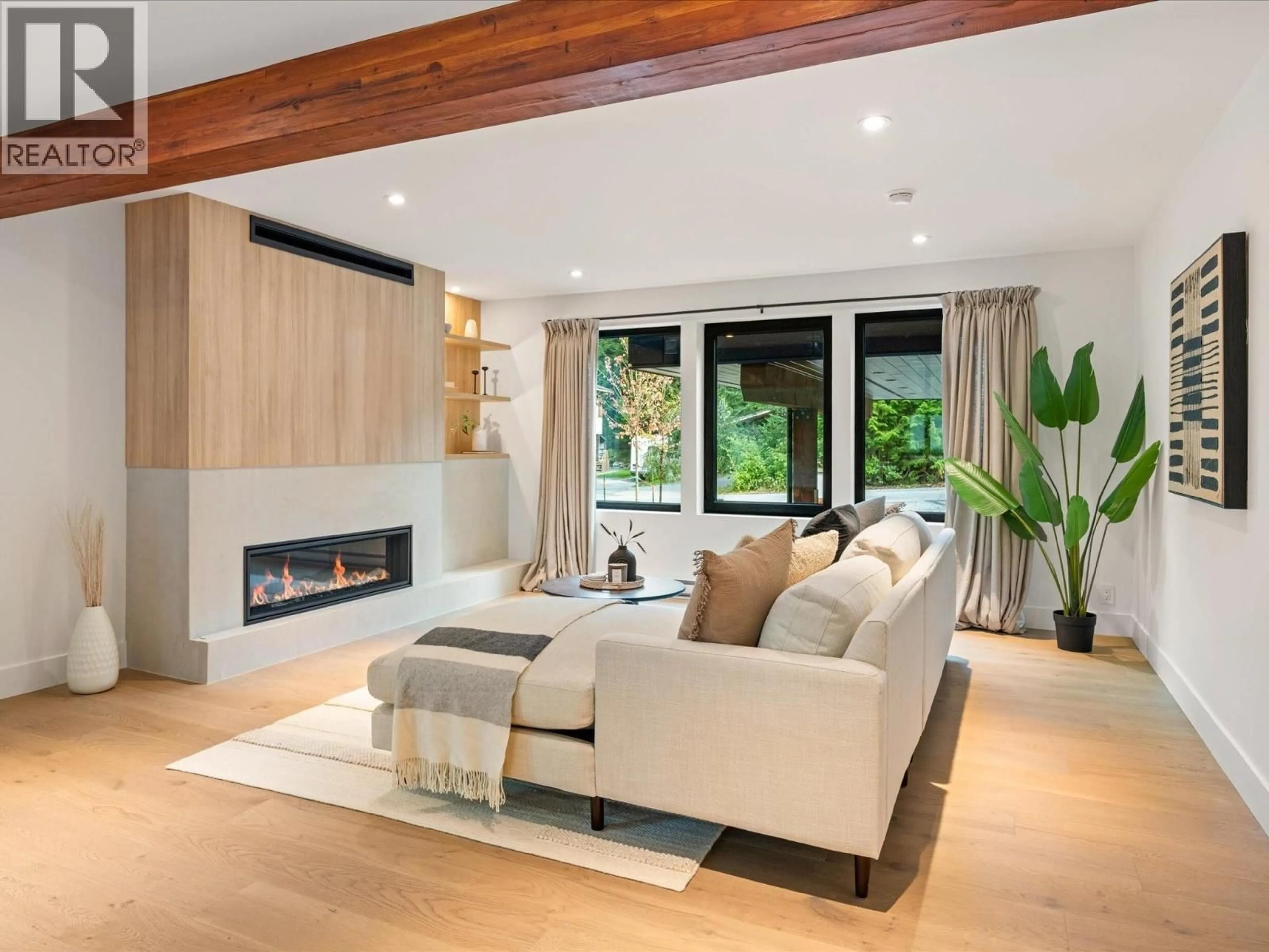 Living room with furniture, wood/laminate floor for 3005 BRIO ENTRANCE, Whistler British Columbia V8E0B8