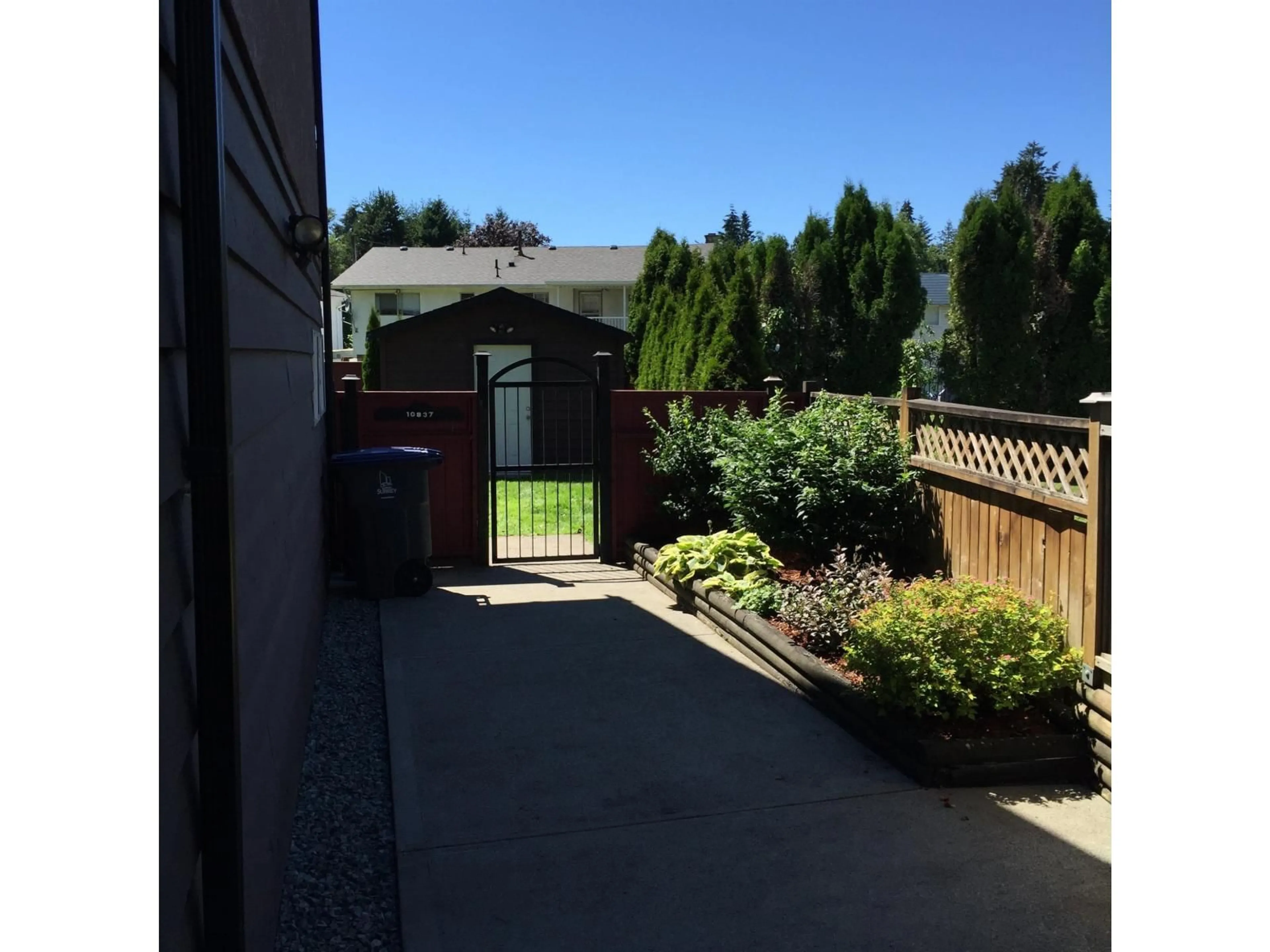 A pic from outside/outdoor area/front of a property/back of a property/a pic from drone, street for 10837 145A, Surrey British Columbia V3R3S2
